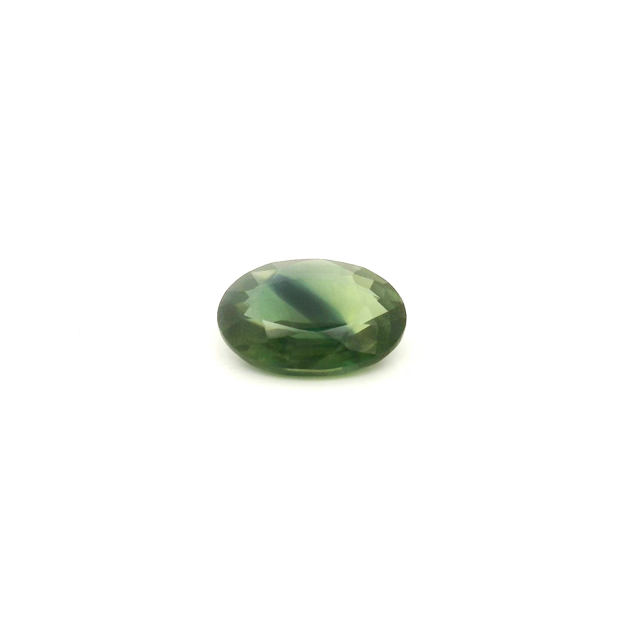 0.64 Carat Green Oval Sapphire