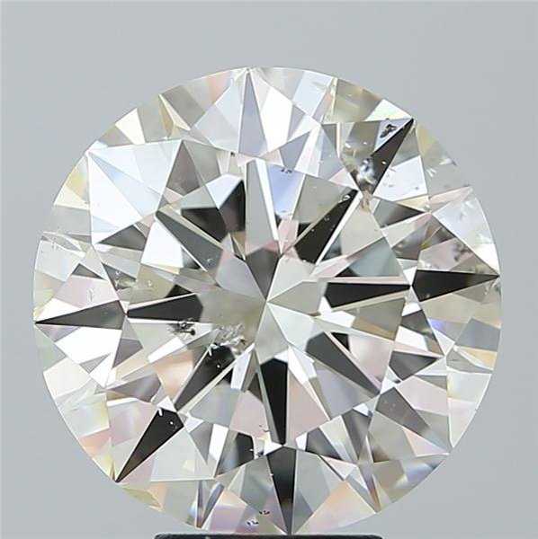 7.04ct J SI2 Rare Carat Ideal Cut Round Diamond