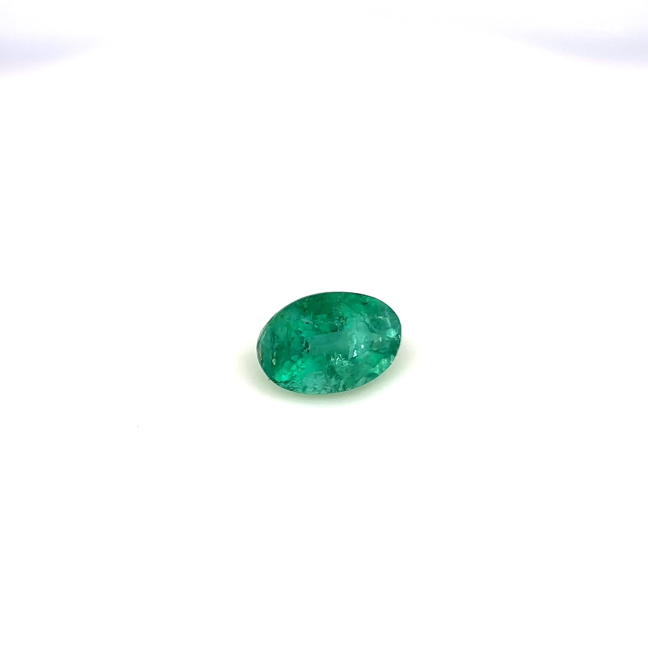 0.52 Carat Vivid Green Oval Emerald