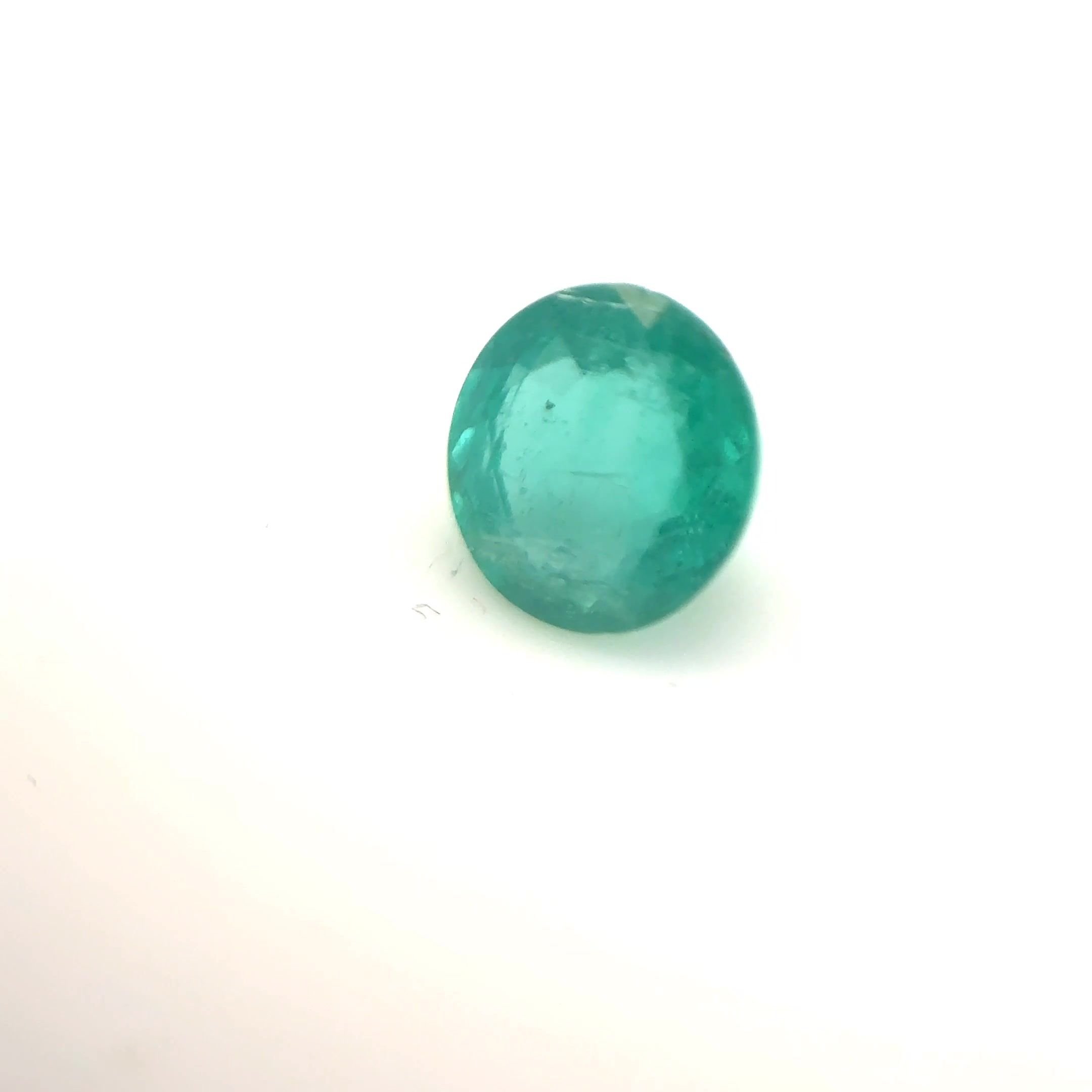 0.52 Carat Light Green Round Emerald