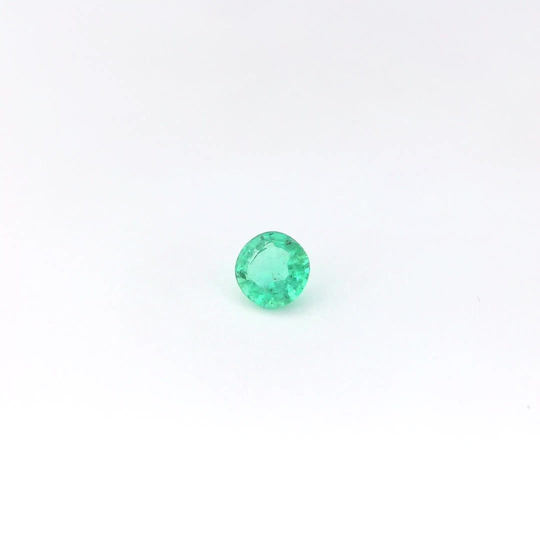 0.39 Carat Green Round Emerald