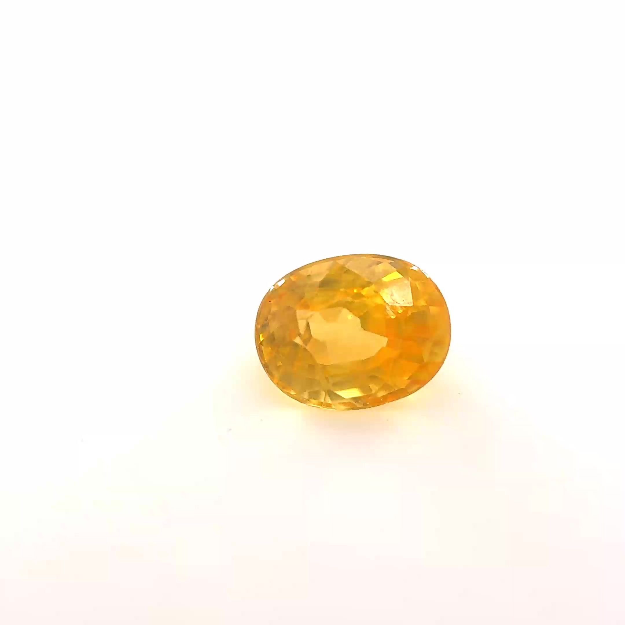 0.62 Carat Vivid Yellow Oval Sapphire