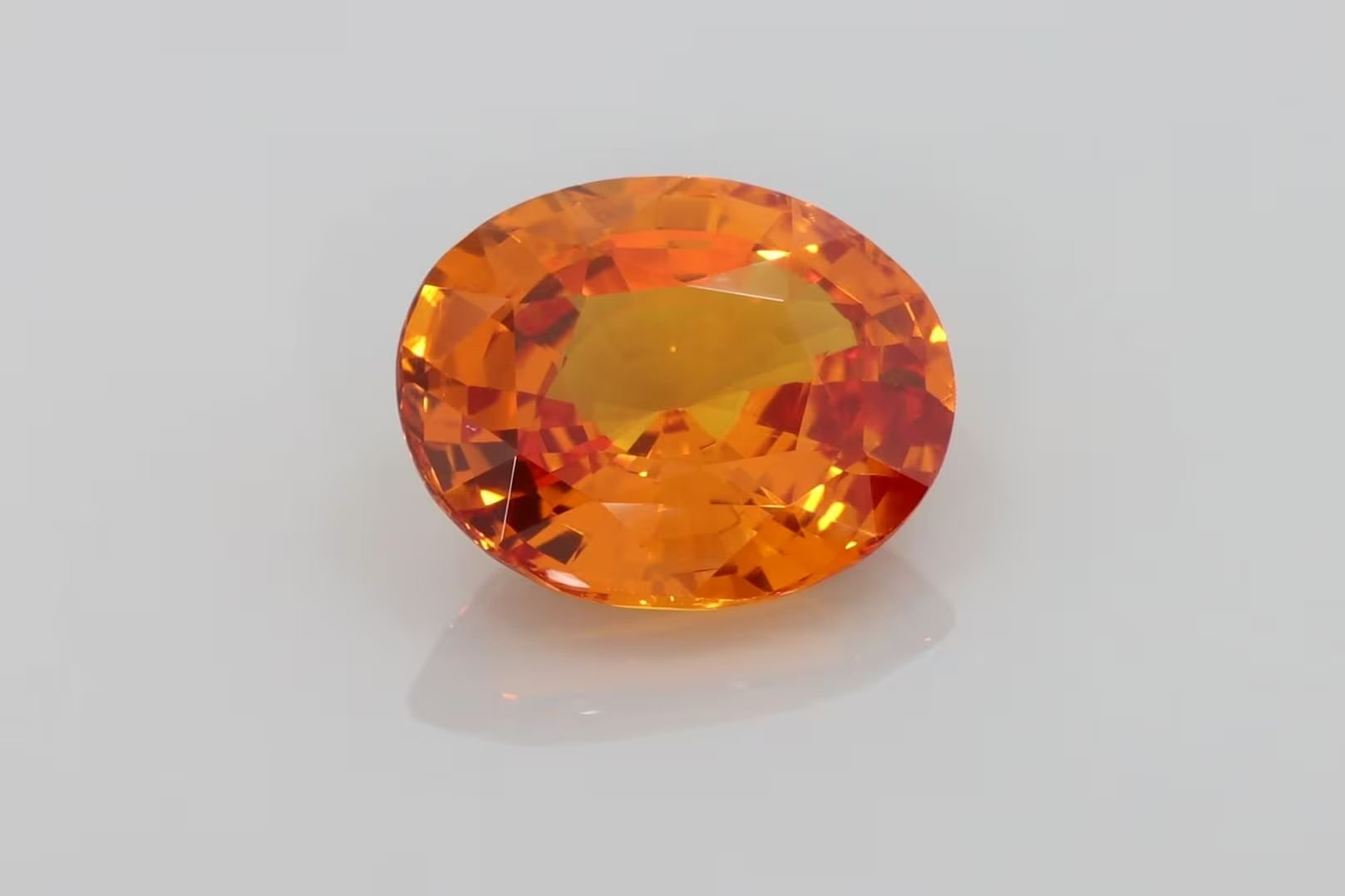 7.53 Carat Orange Oval Sapphire