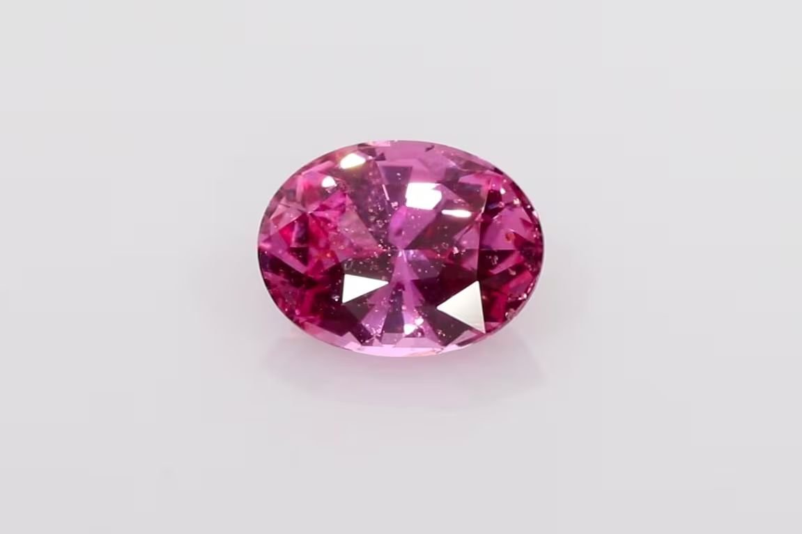 1.52 Carat Vivid Pink Oval Sapphire