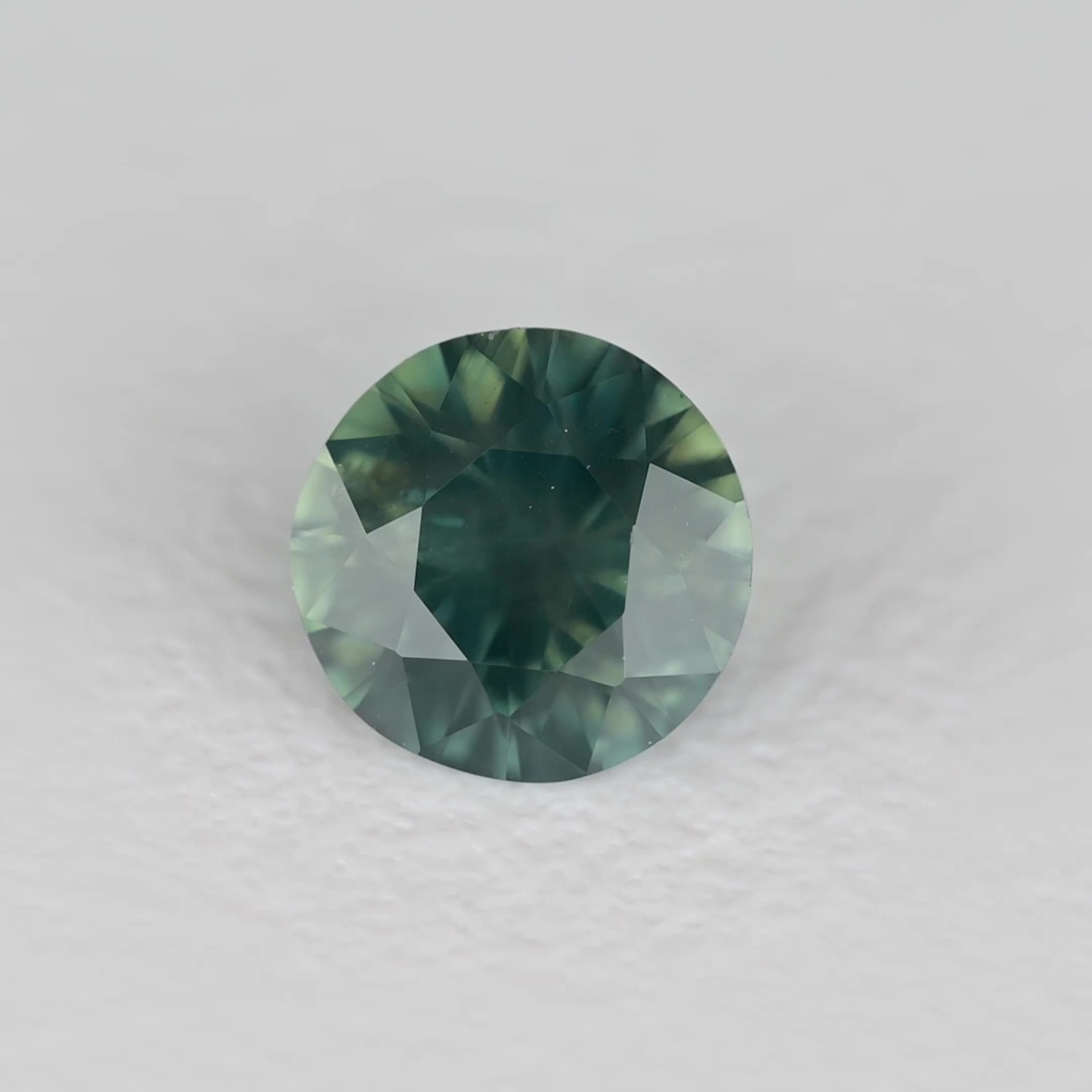 0.44 Carat Teal Round Sapphire