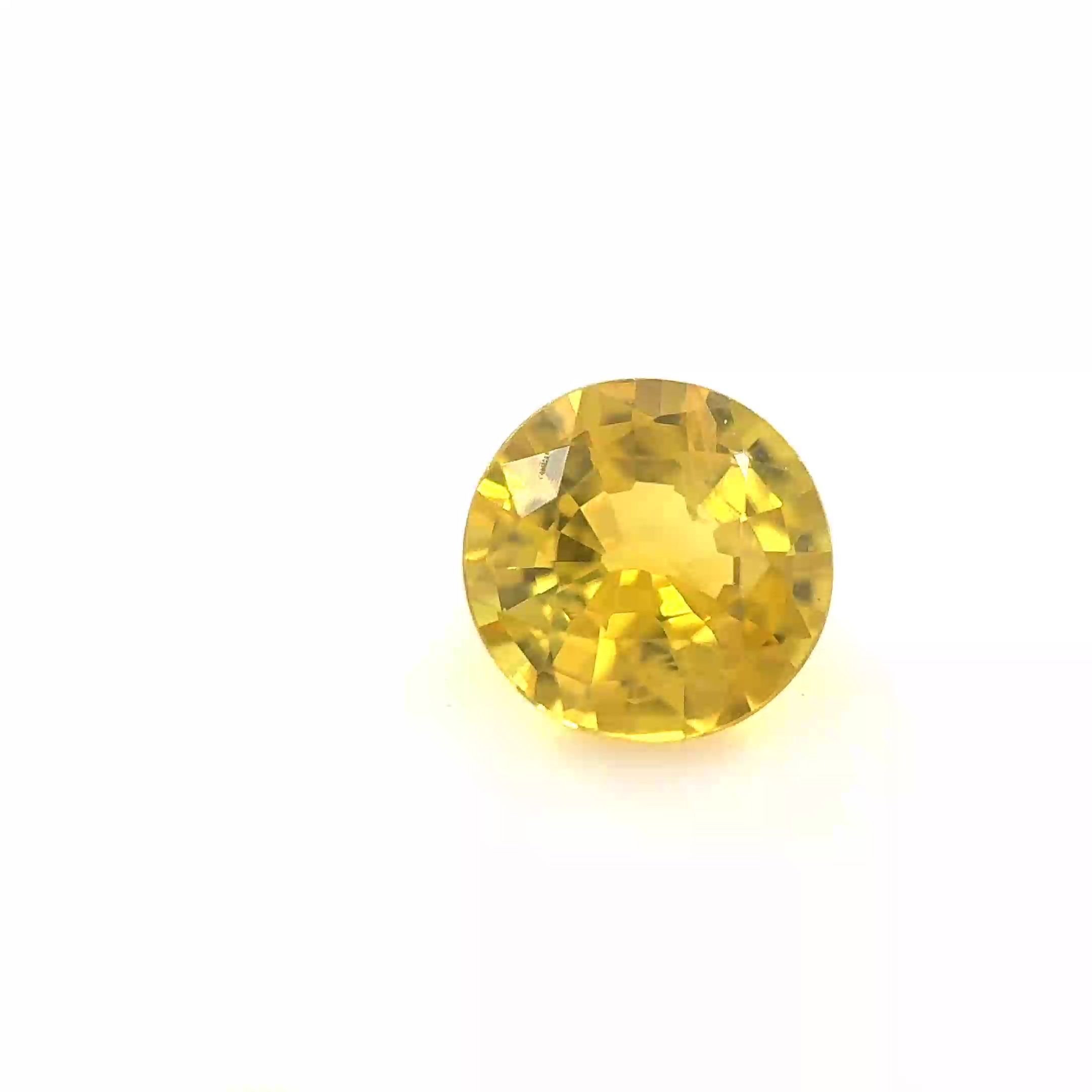 0.83 Carat Intense Yellow Round Sapphire