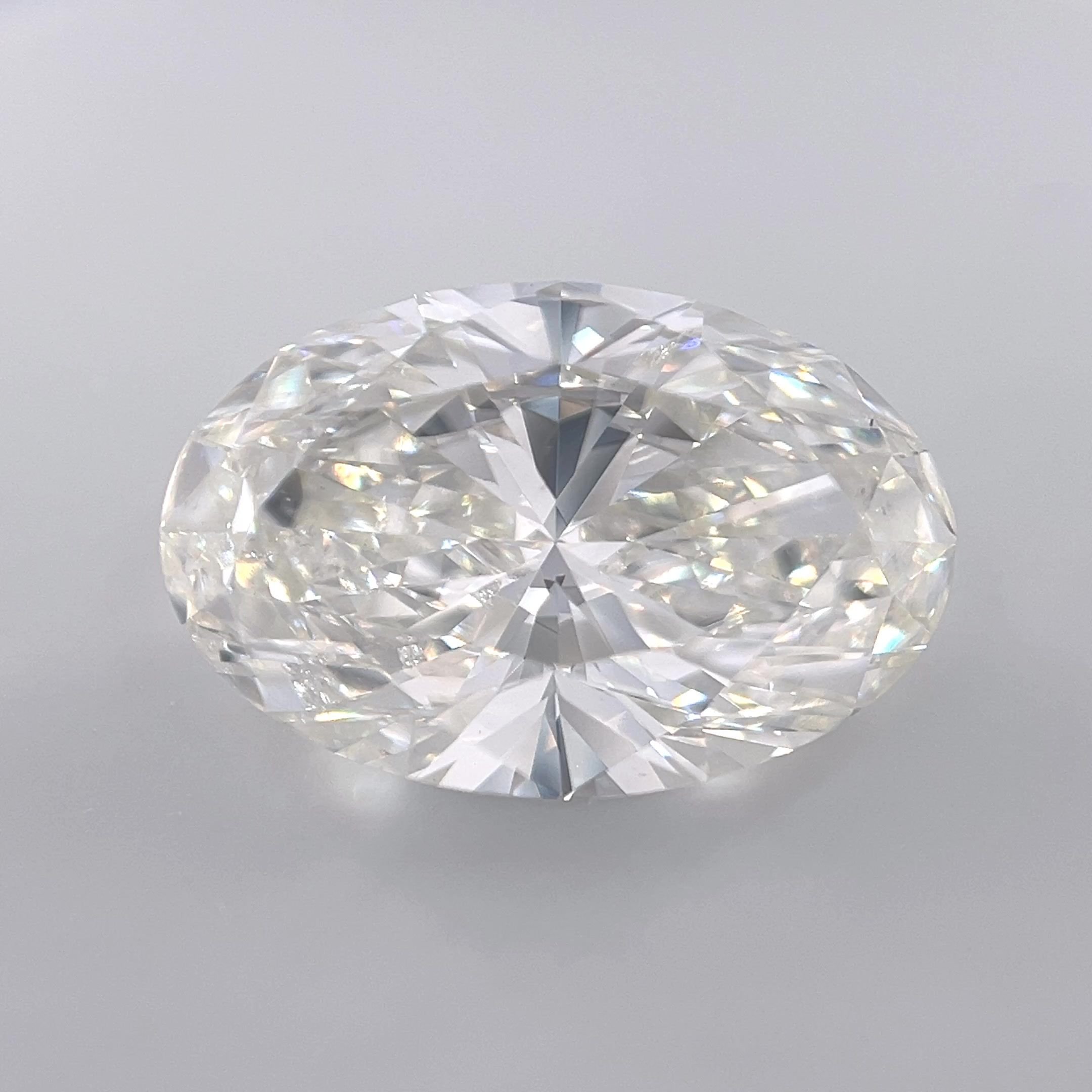 6.01ct J SI2 Rare Carat Ideal Cut Oval Diamond