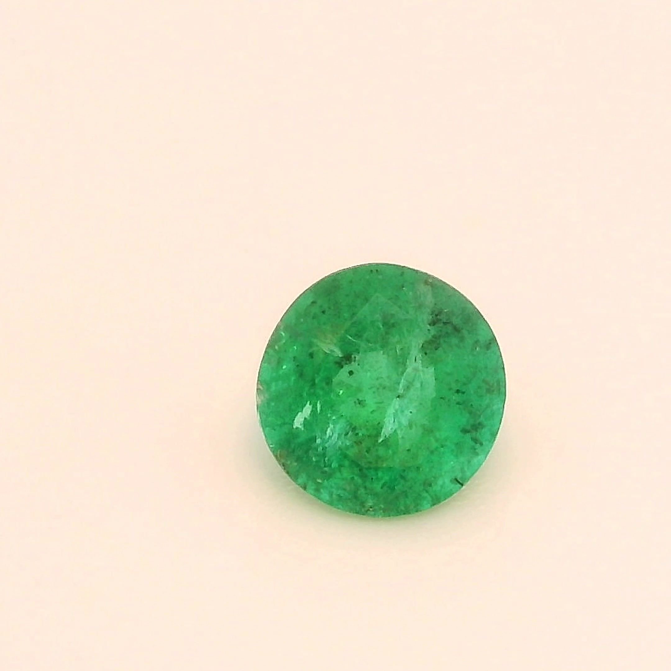 0.32 Carat Green Round Emerald