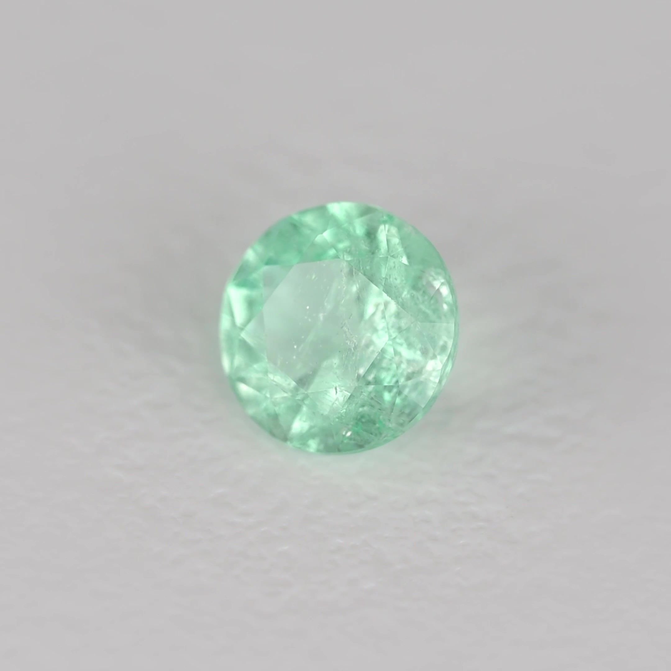 0.24 Carat Green Round Emerald