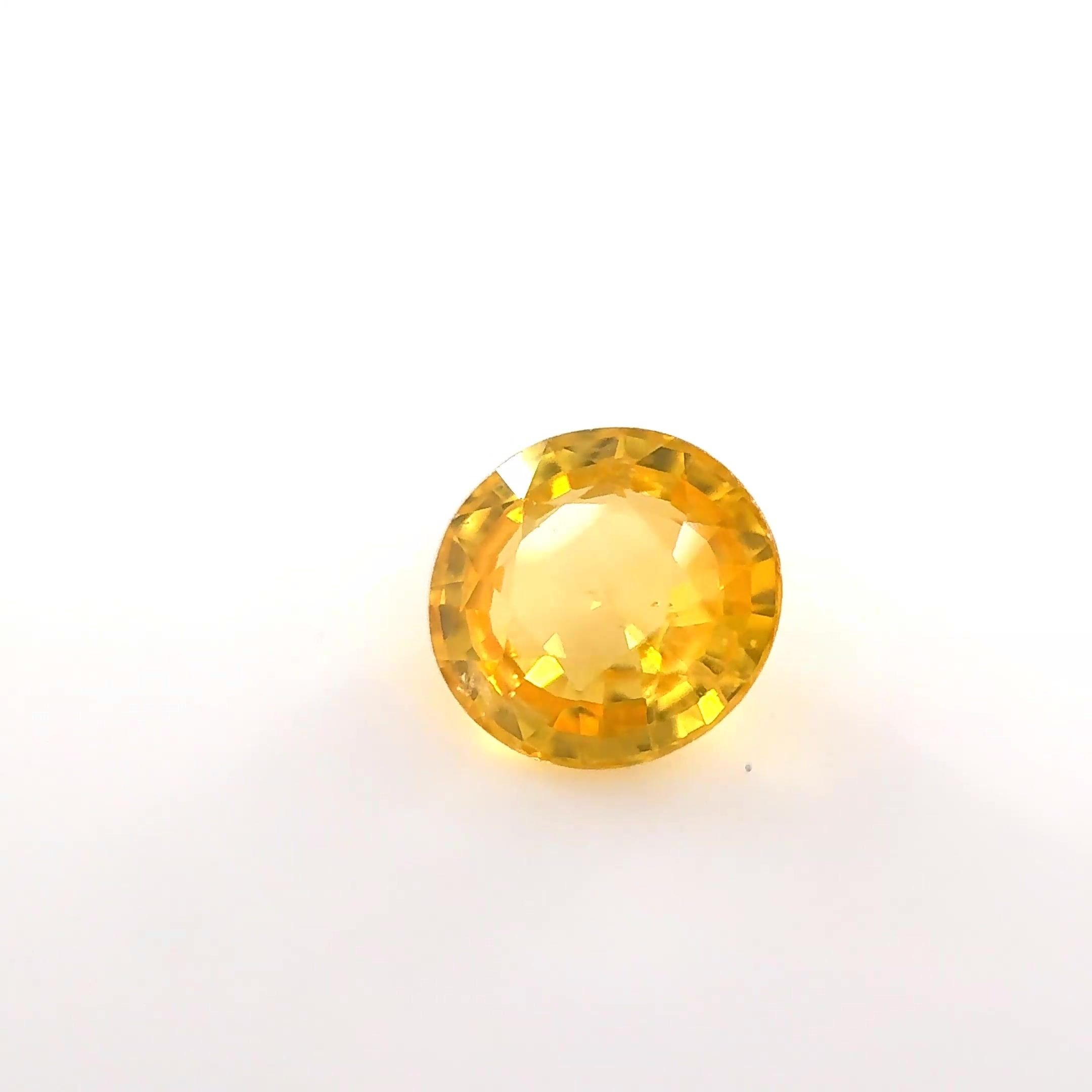 0.71 Carat Yellow Round Sapphire