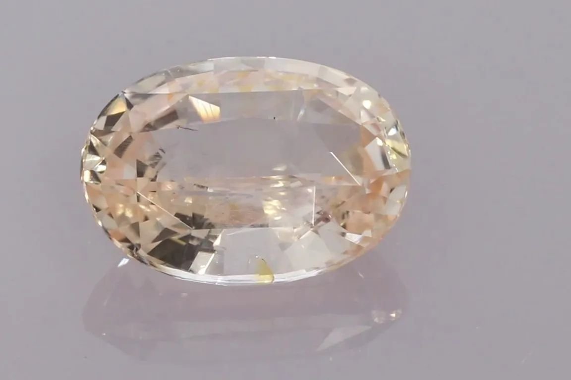 5.63 Carat Orange Oval Sapphire