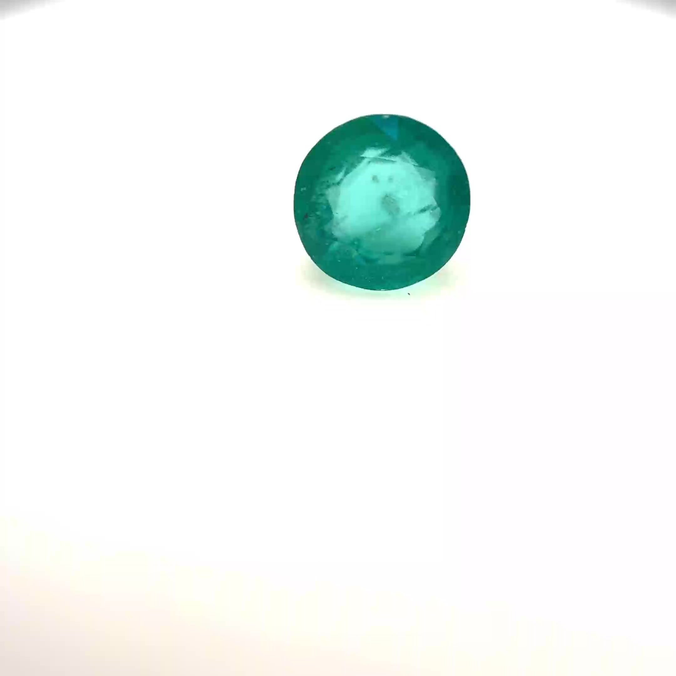 0.73 Carat Green Round Emerald