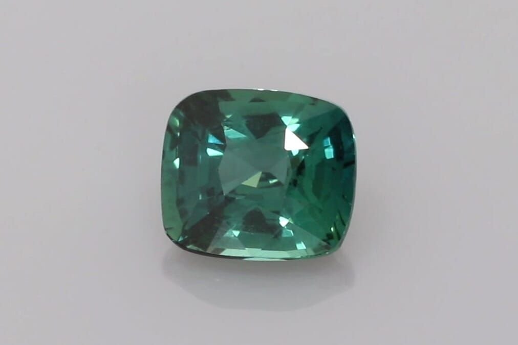 1.57 Carat Vivid Teal Cushion Sapphire