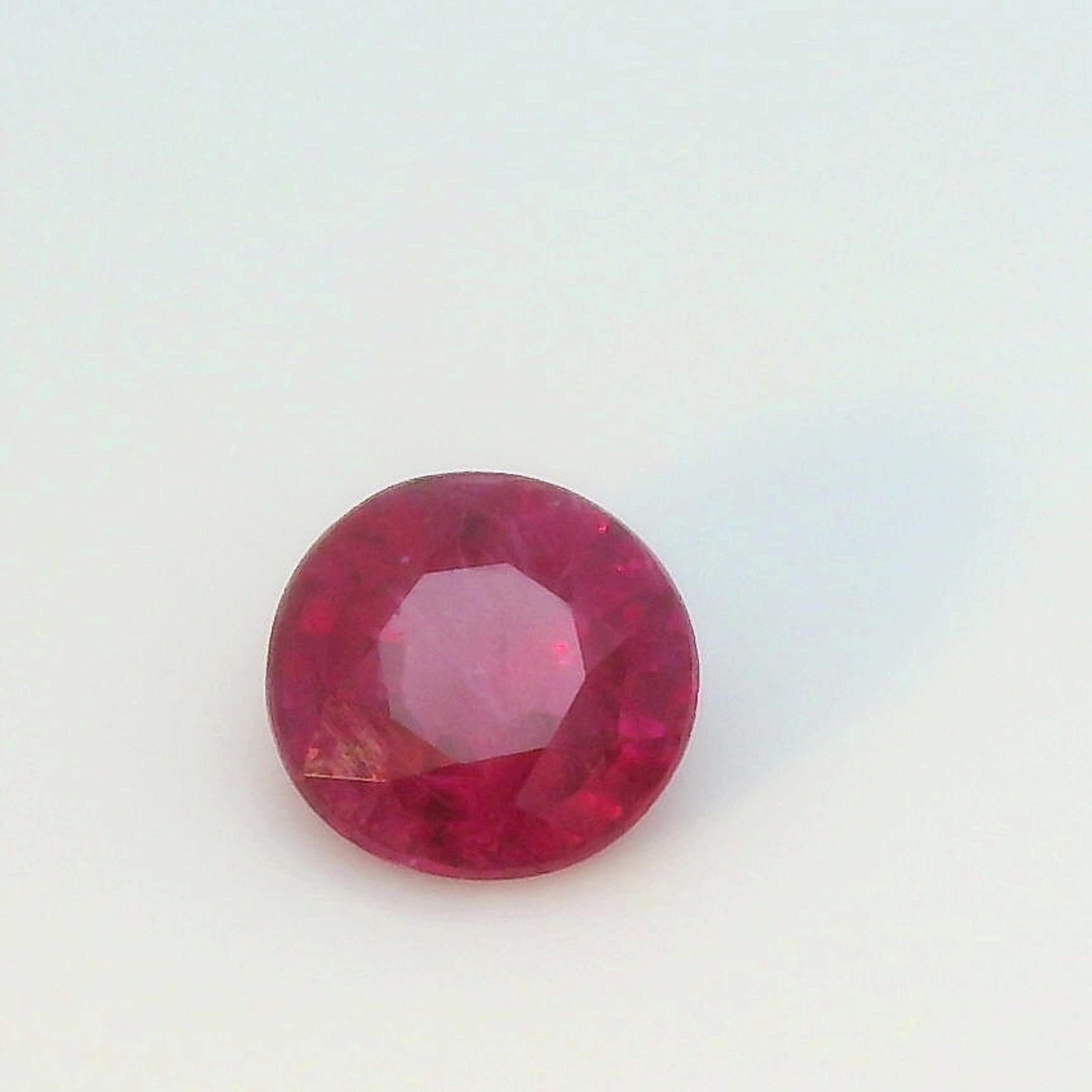 0.49 Carat Red Round Ruby