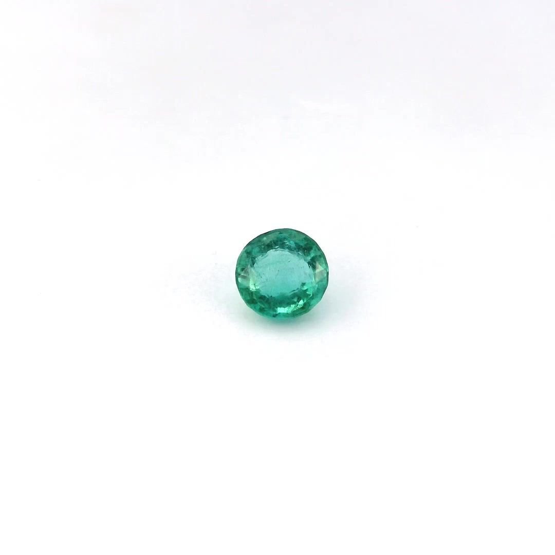 0.68 Carat Intense Green Round Emerald