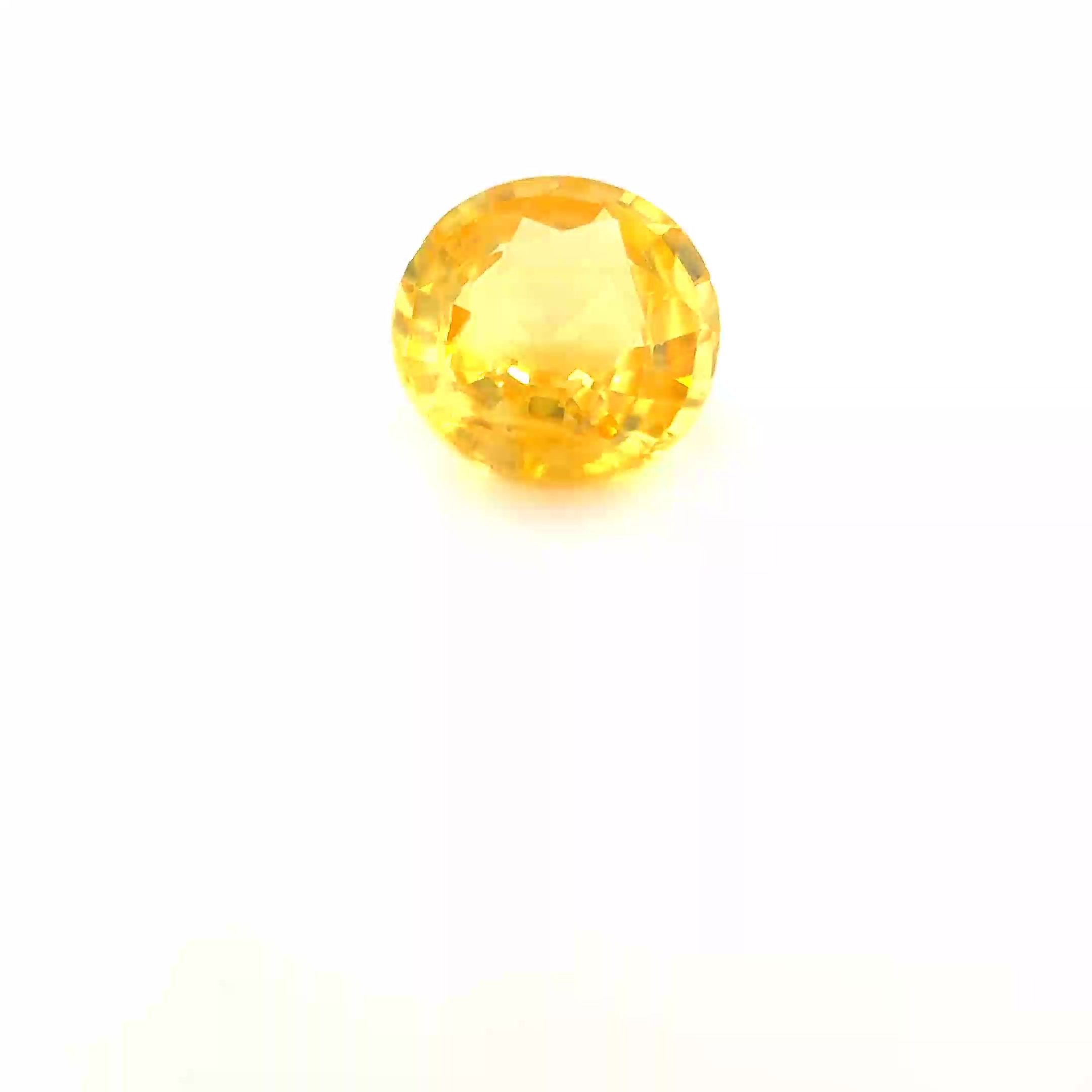 0.79 Carat Yellow Round Sapphire