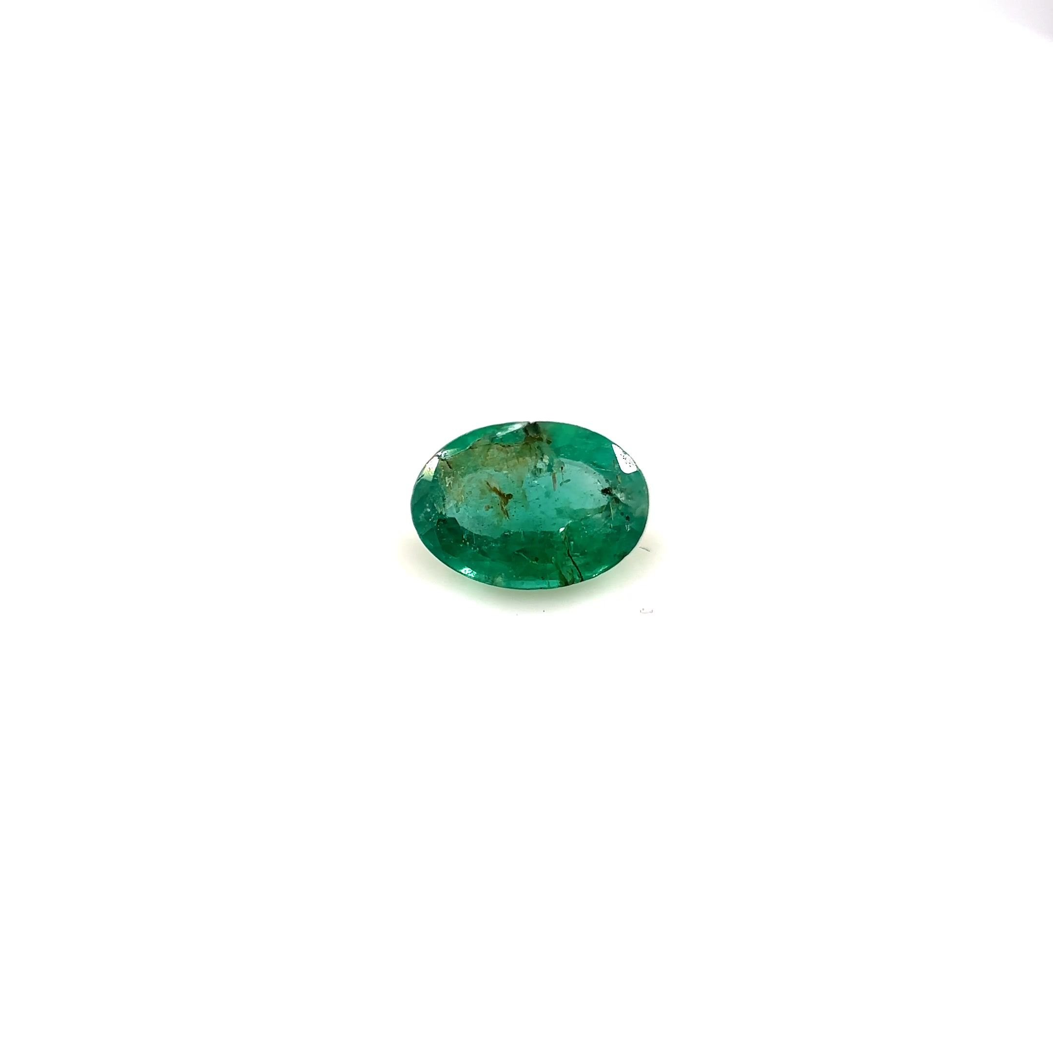 0.65 Carat Vivid Green Oval Emerald