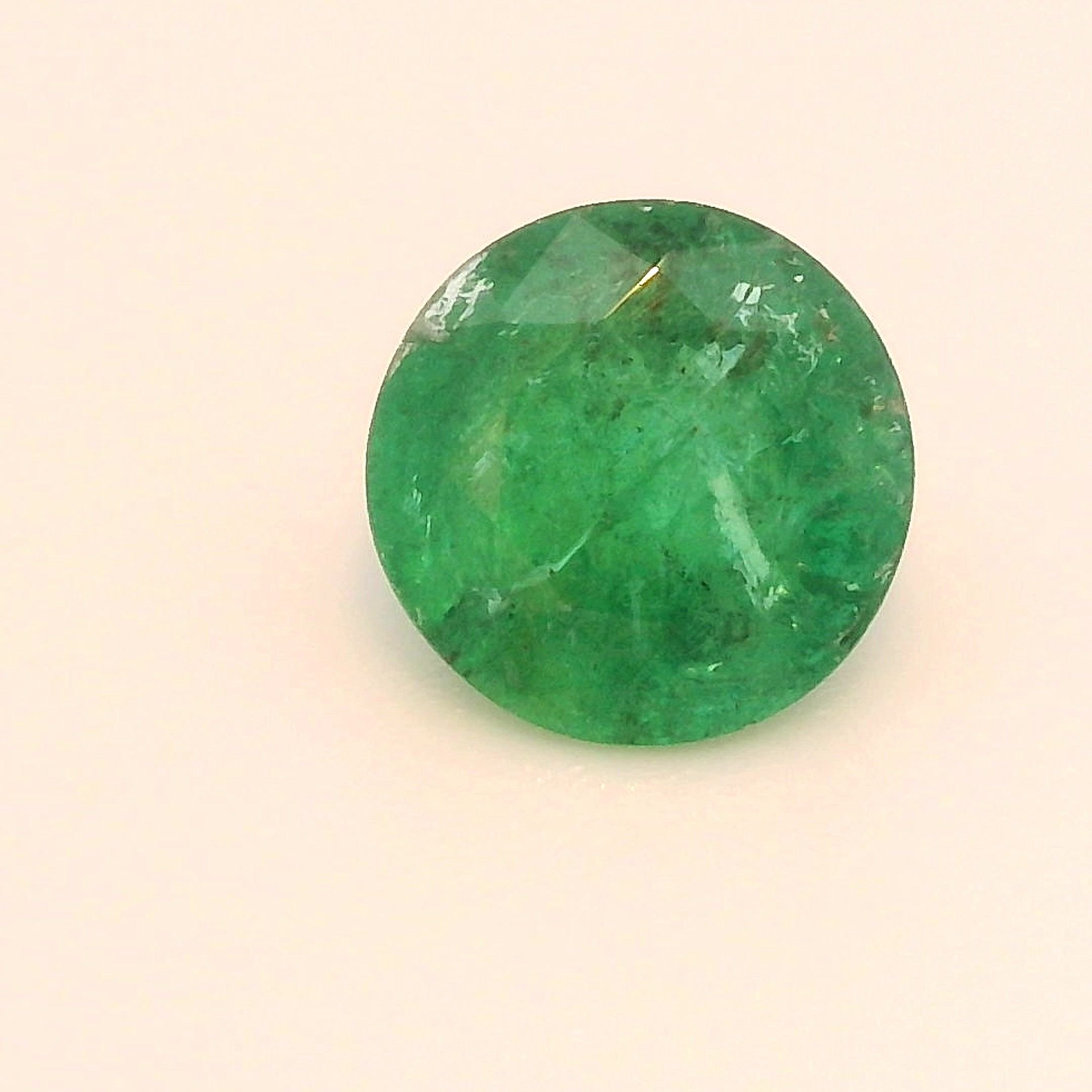 0.65 Carat Green Round Emerald