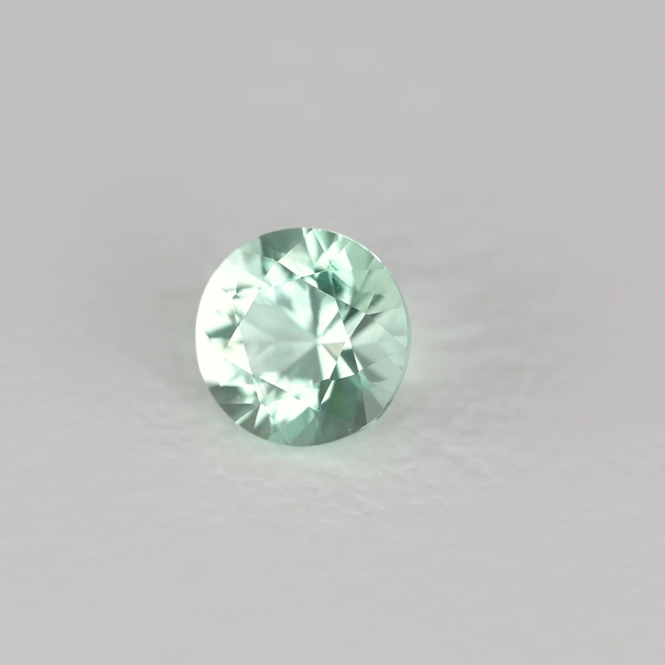 0.16 Carat Green Round Emerald