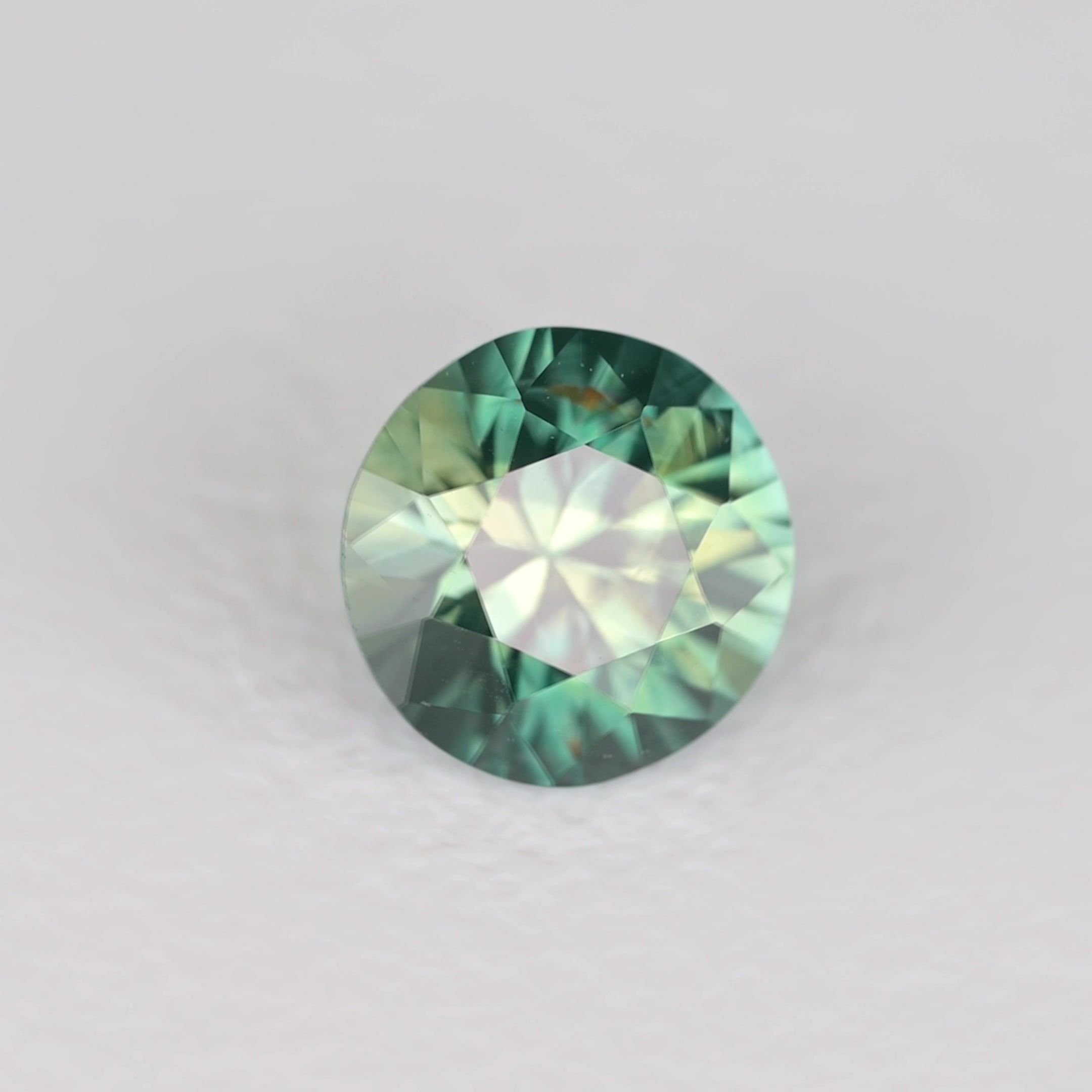 0.46 Carat Teal Round Sapphire