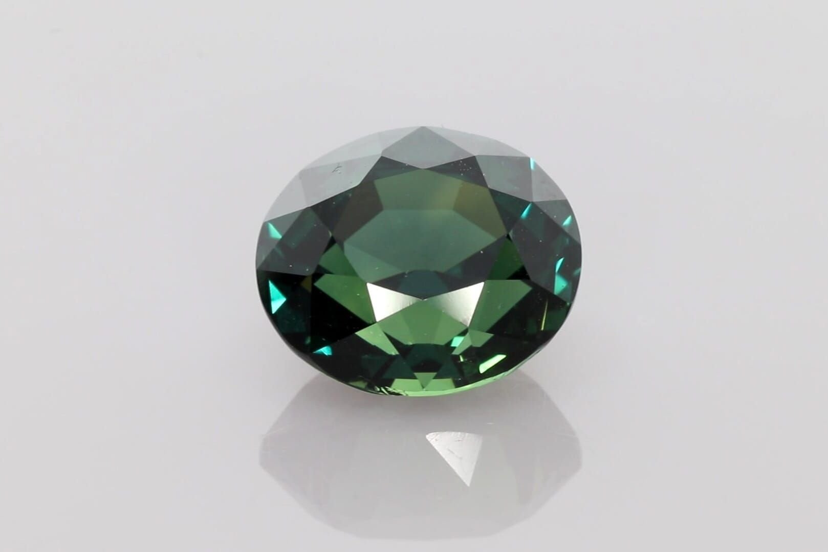 8.29 Carat Teal Oval Sapphire
