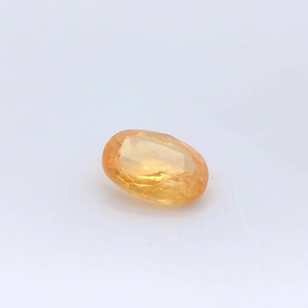 4.12 Carat Intense Orange Oval Sapphire