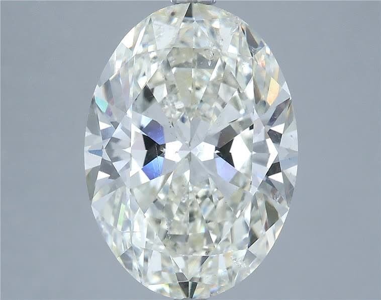 7.01ct J SI1 Rare Carat Ideal Cut Oval Diamond