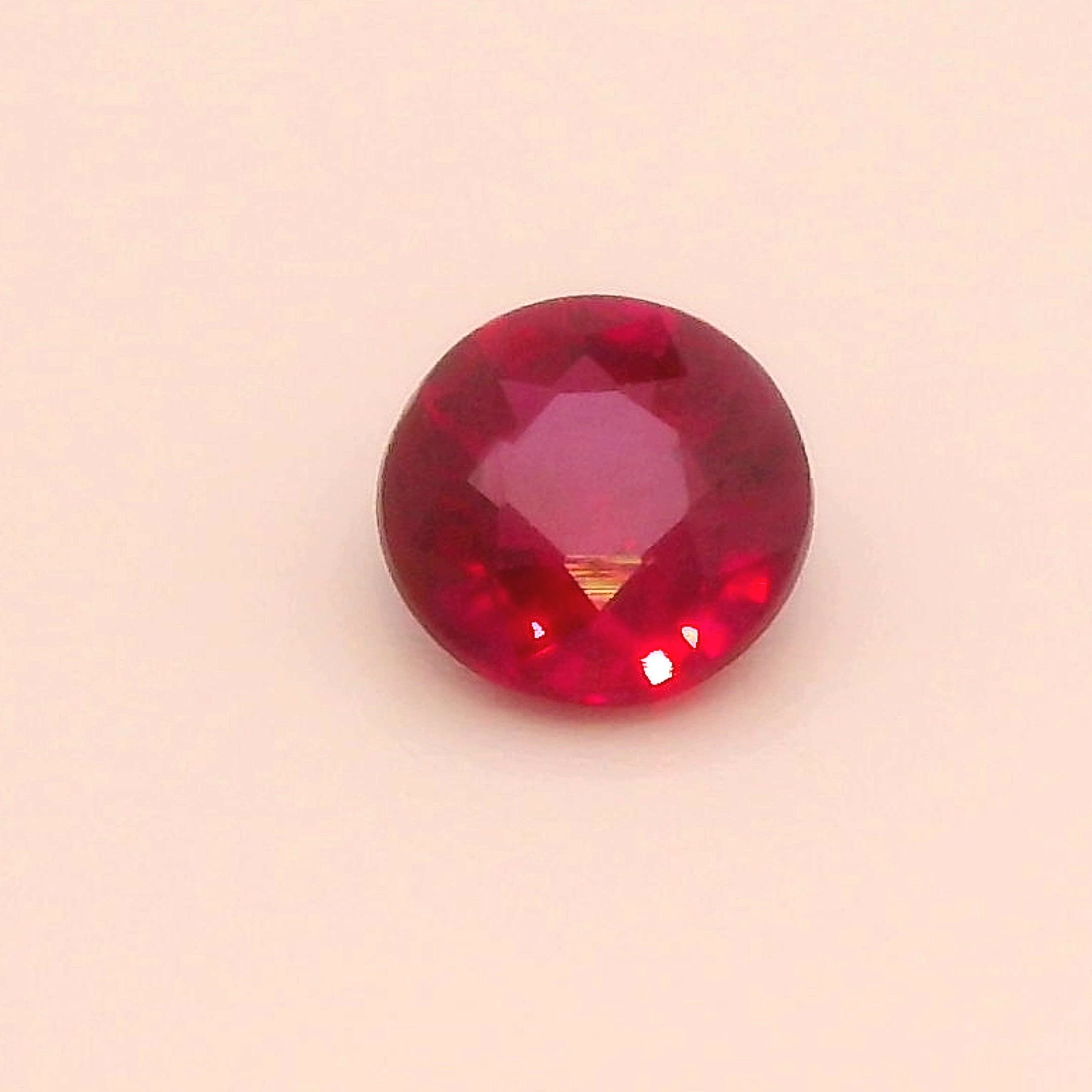 0.33 Carat Vivid Red Round Ruby