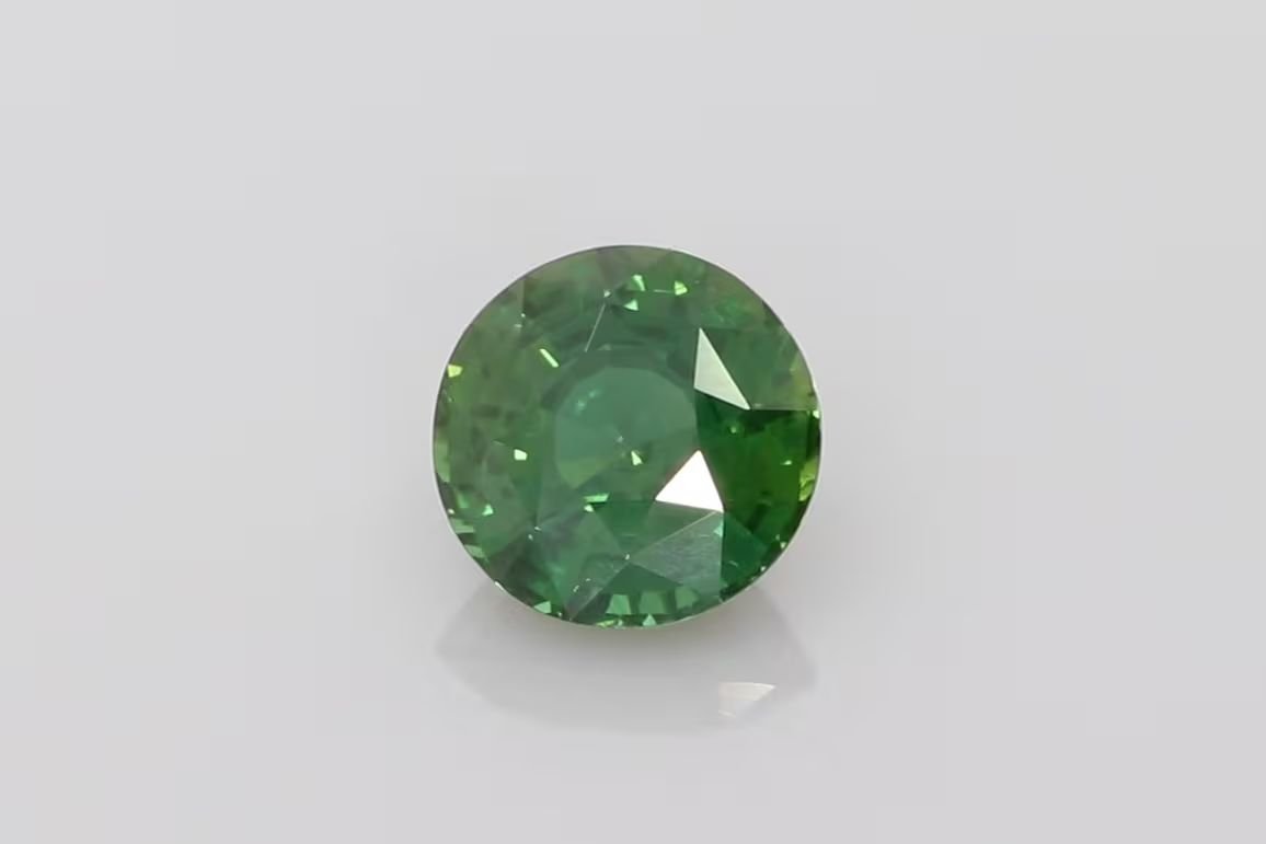 5.58 Carat Vivid Green Round Sapphire