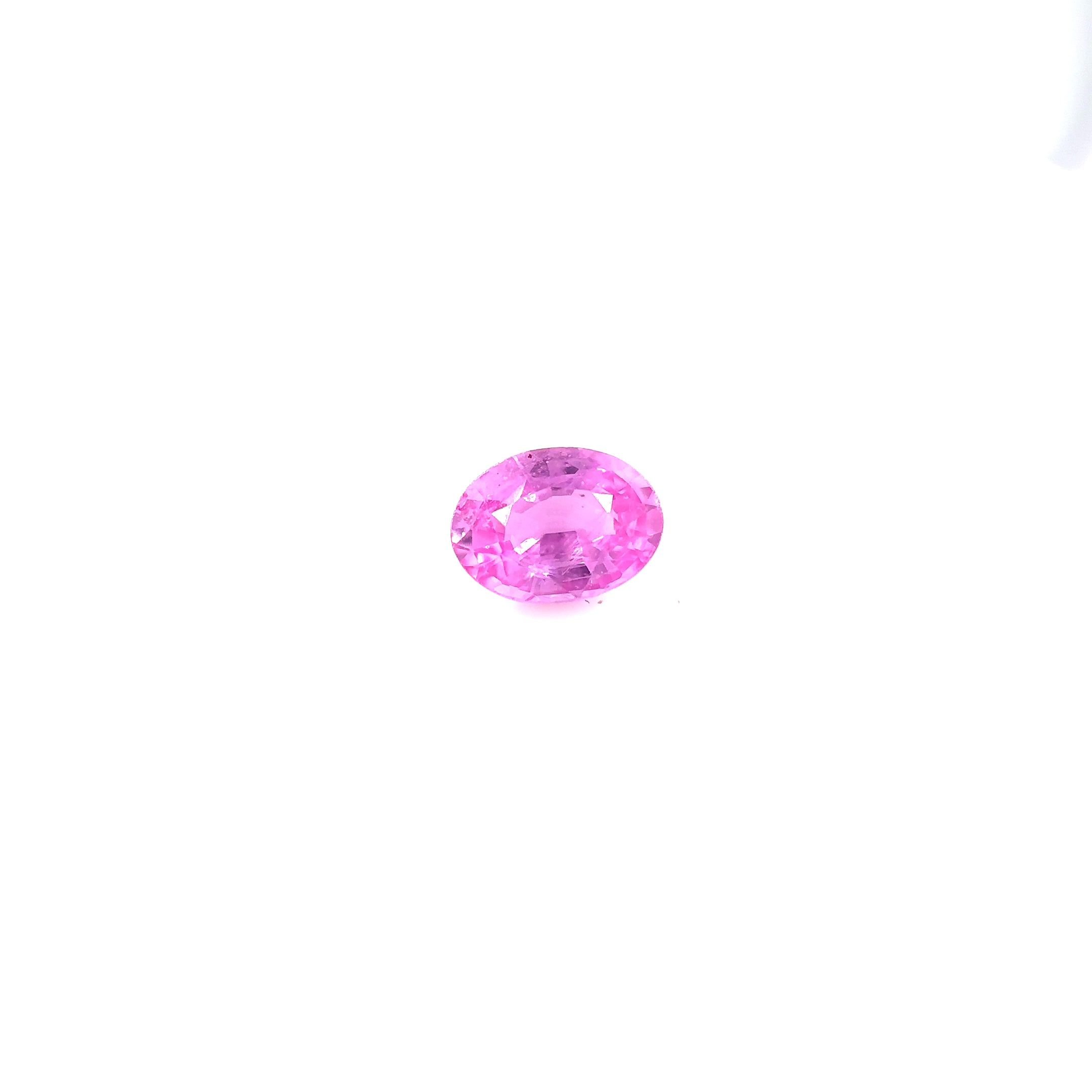 0.88 Carat Vivid Pink Oval Sapphire