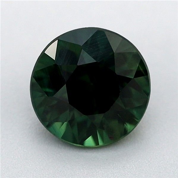 0.64 Carat Teal Round Sapphire