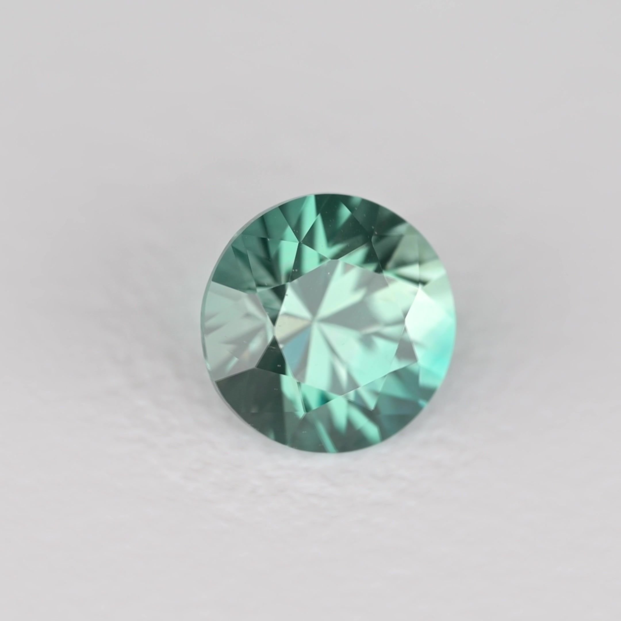 0.48 Carat Teal Round Sapphire