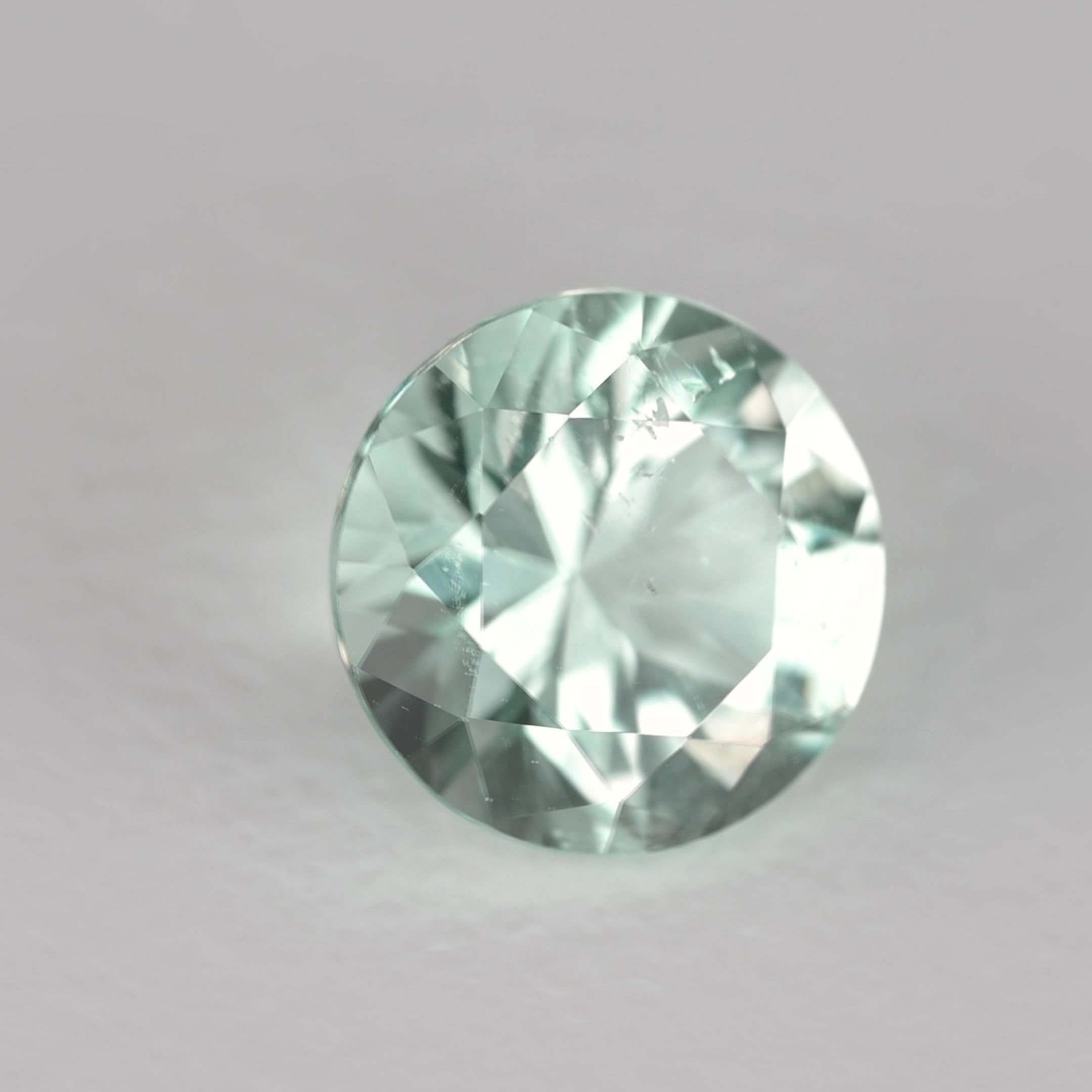 0.82 Carat Green Round Emerald
