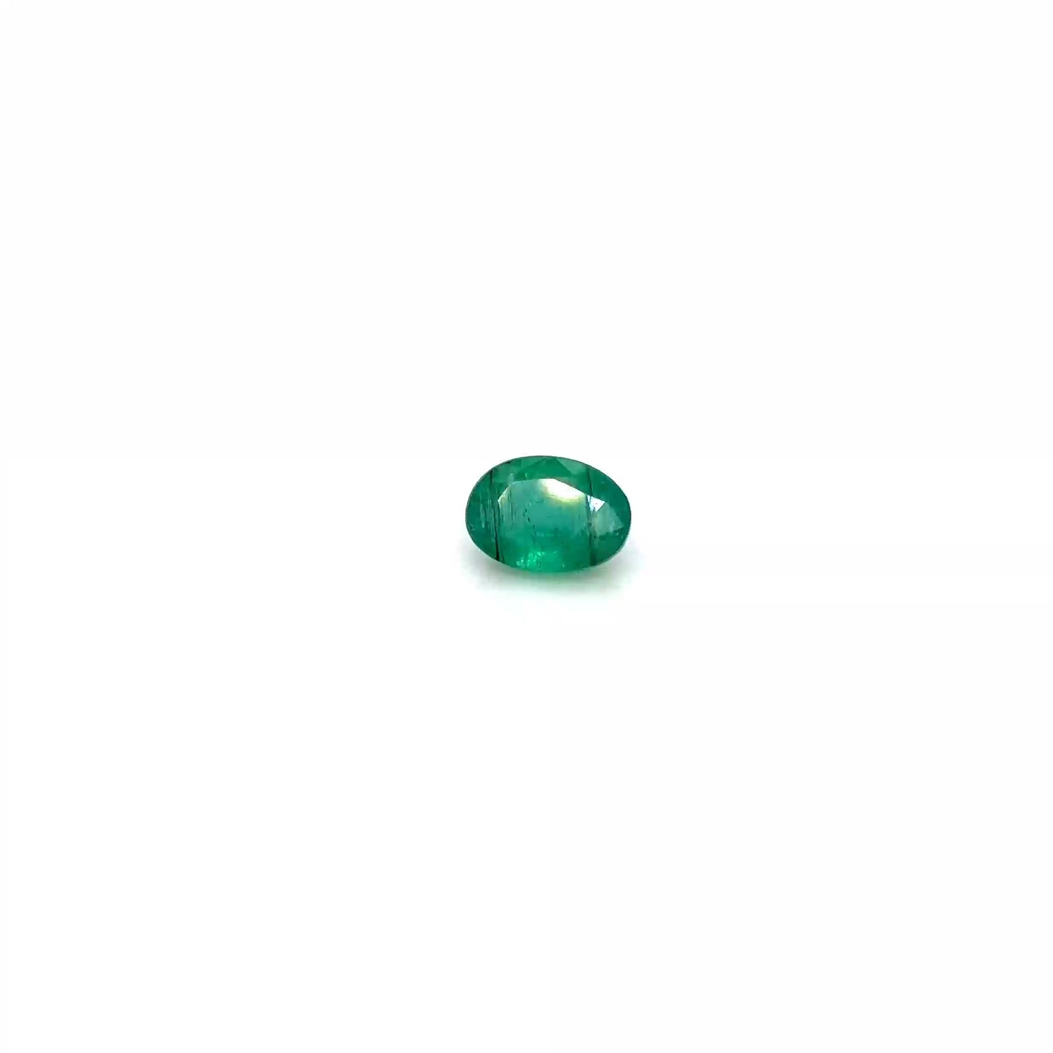 0.85 Carat Vivid Green Oval Emerald
