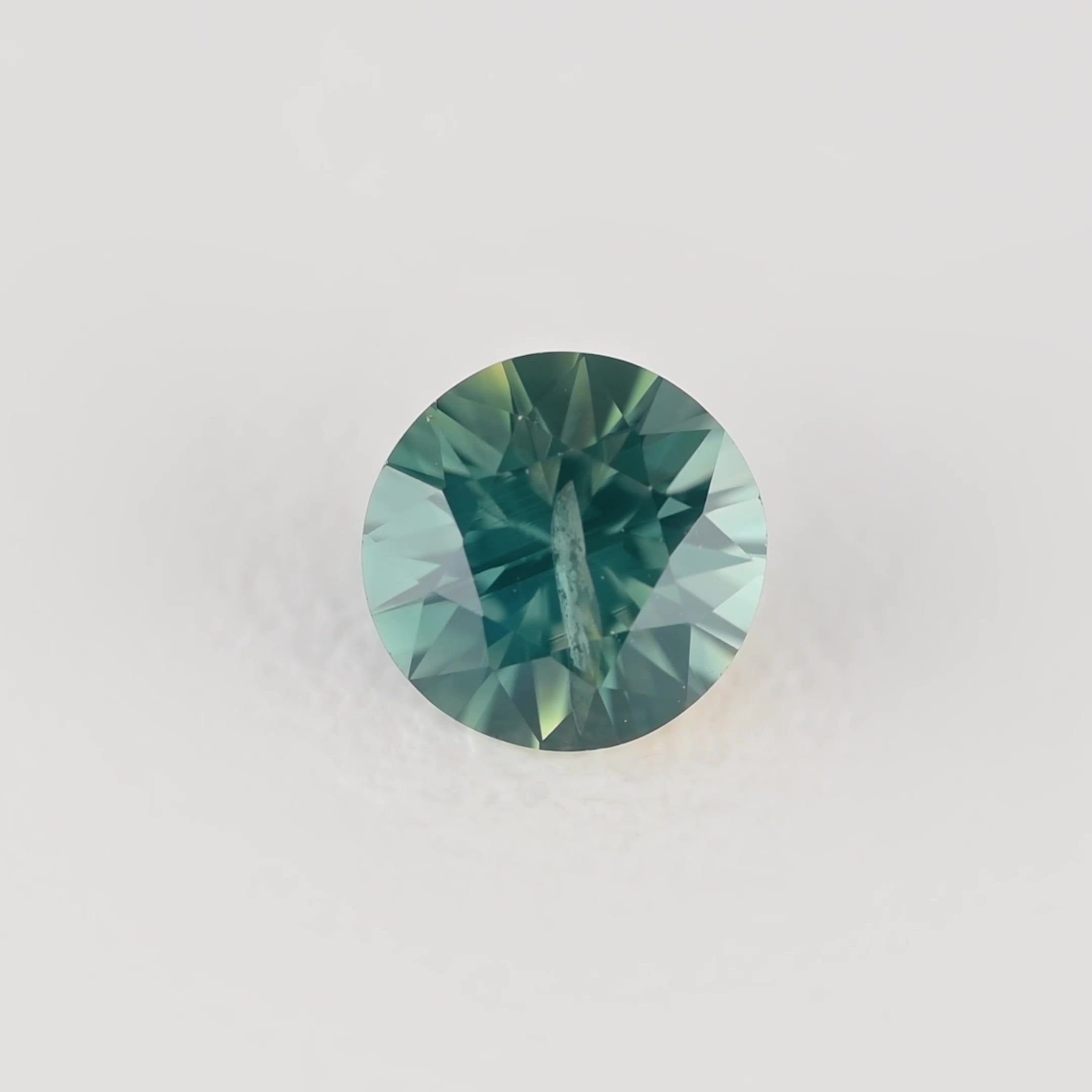 0.32 Carat Teal Round Sapphire