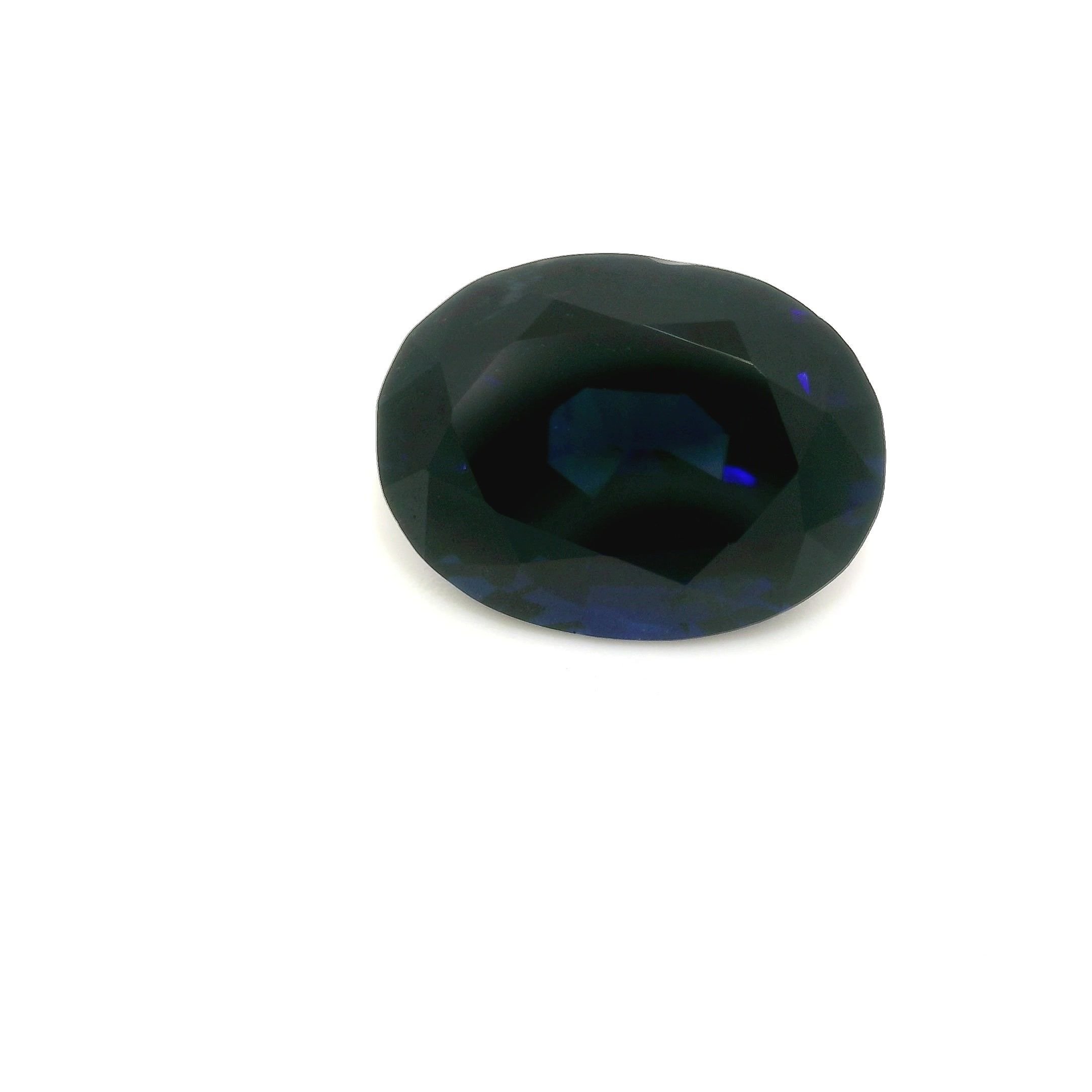 6.11 Carat Dark Blue Oval Sapphire