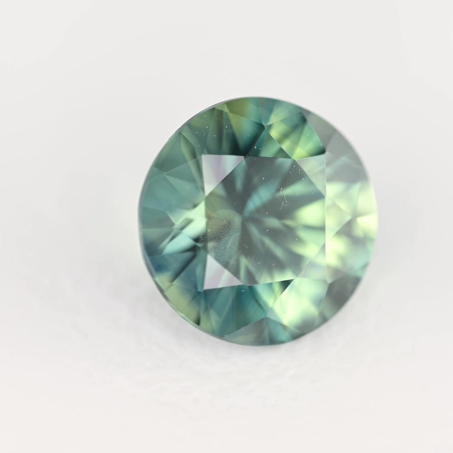 0.60 Carat Teal Round Sapphire
