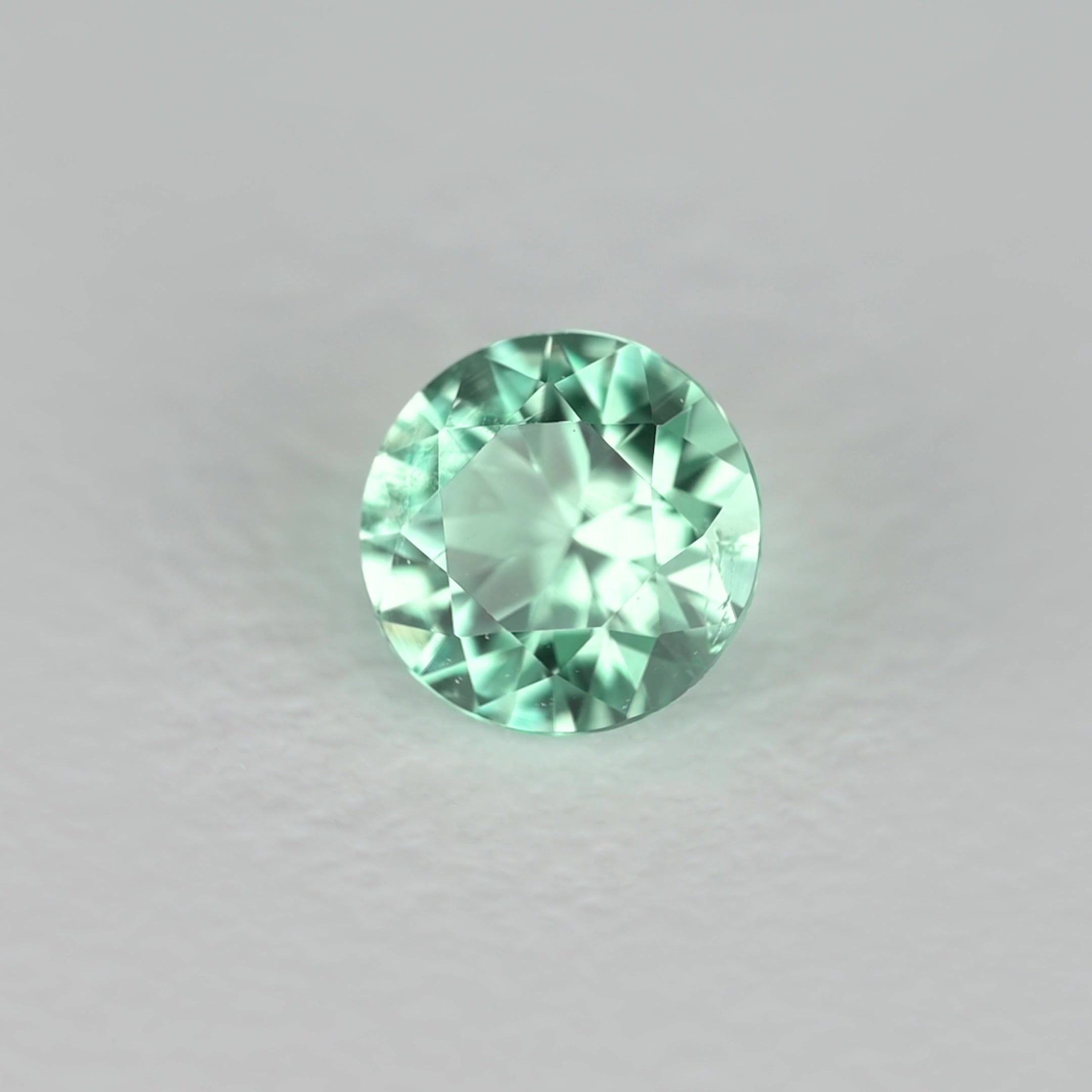 0.21 Carat Green Round Emerald