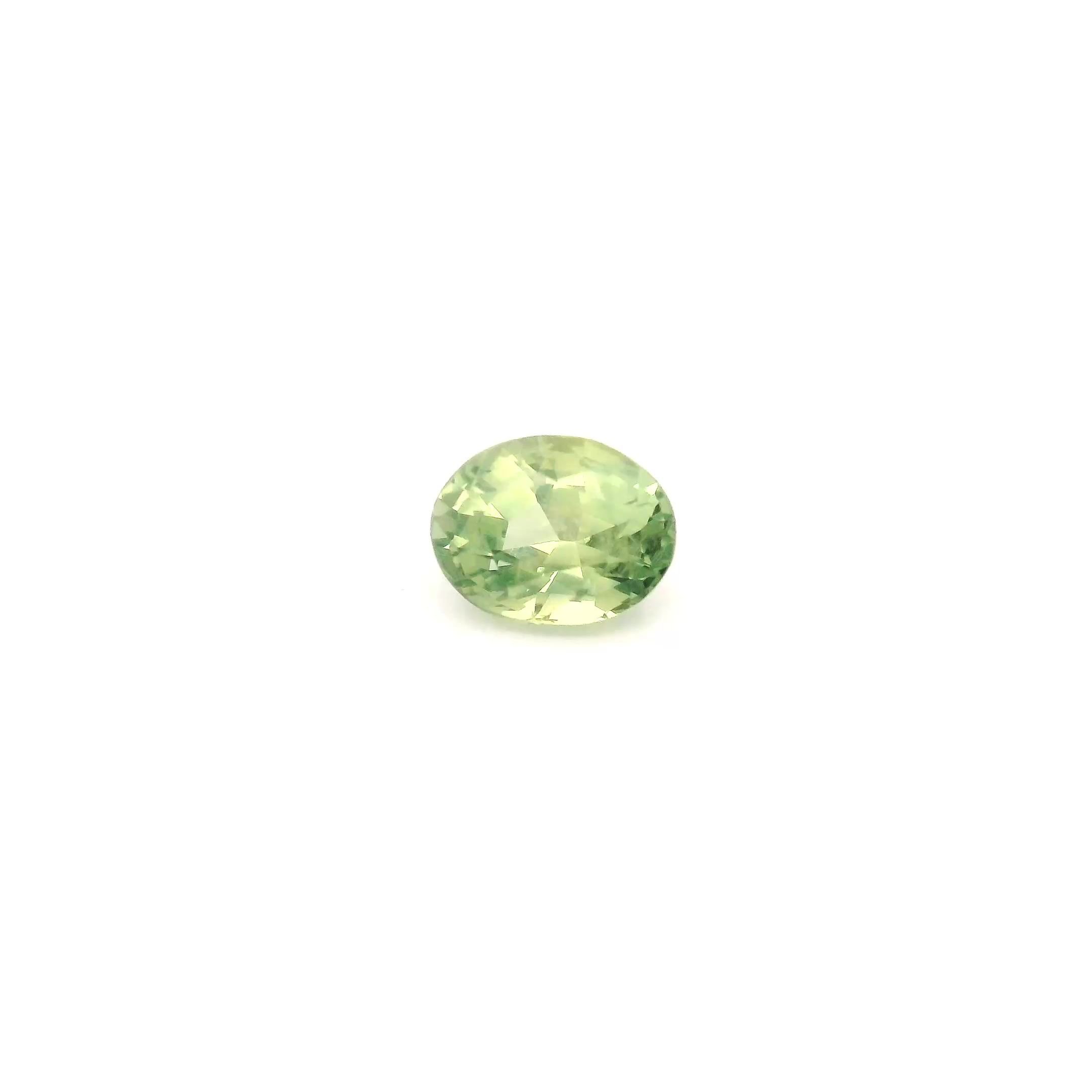 0.72 Carat Light Green Oval Sapphire