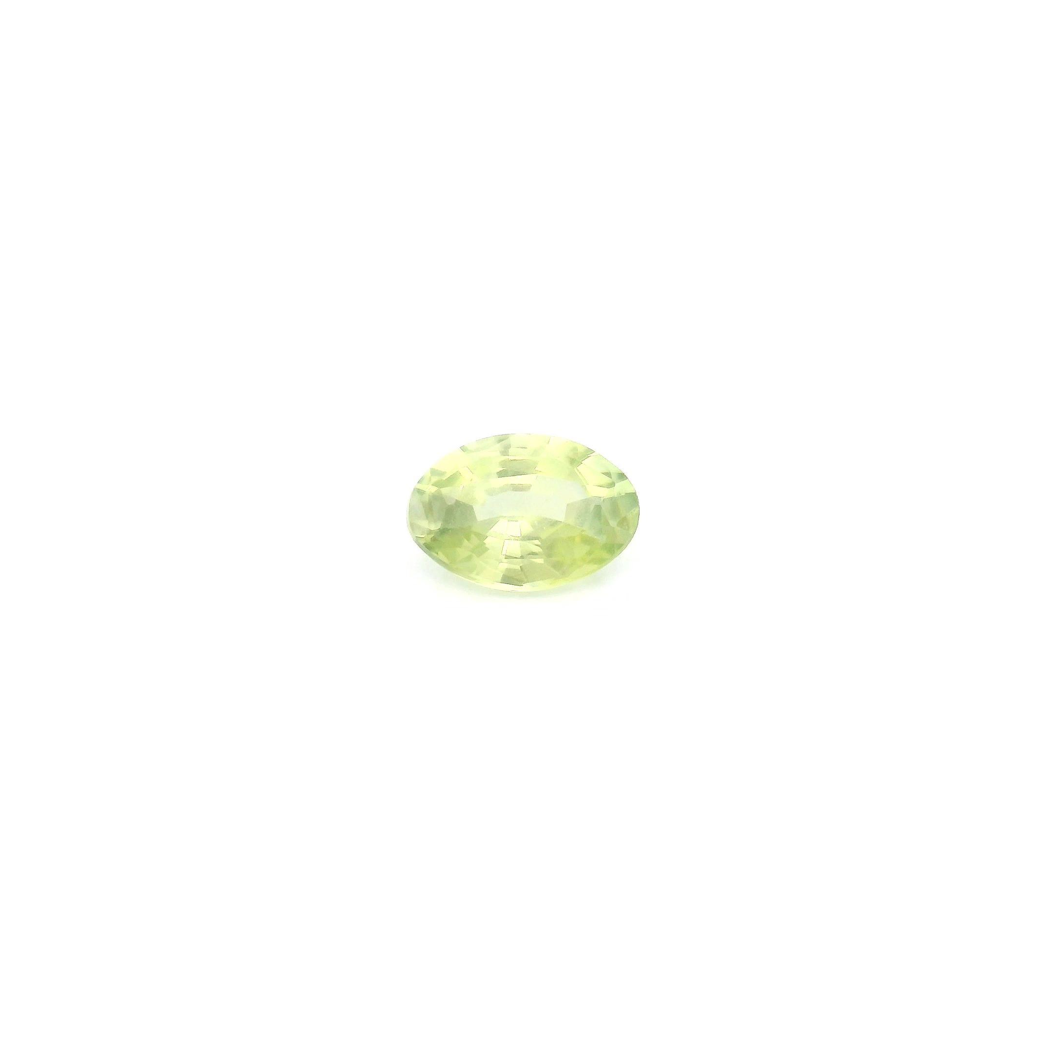 0.46 Carat Light Yellow Oval Sapphire