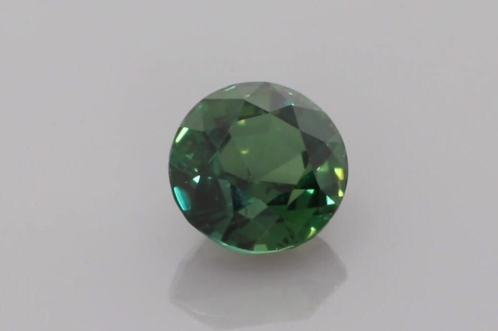1.70 Carat Vivid Teal Round Sapphire