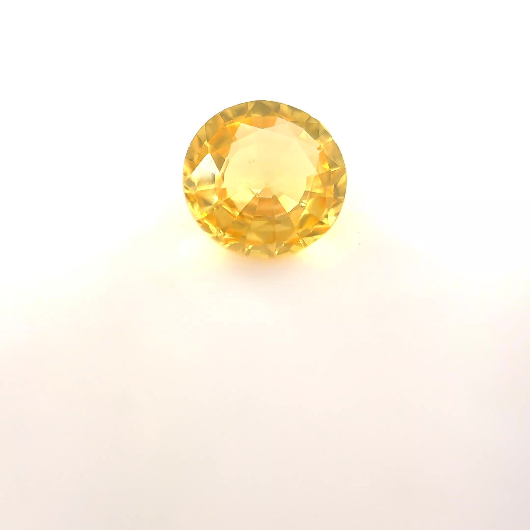 0.85 Carat Yellow Round Sapphire