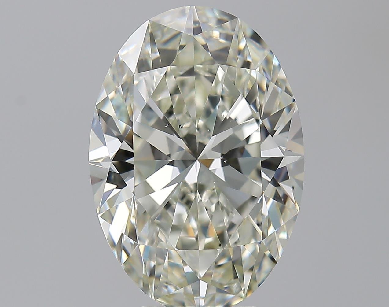 7.01ct K SI1 Rare Carat Ideal Cut Oval Diamond