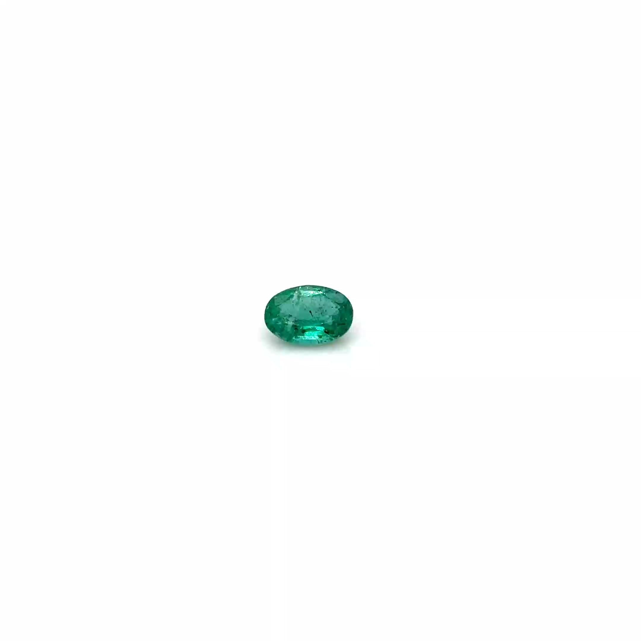 0.61 Carat Vivid Green Oval Emerald