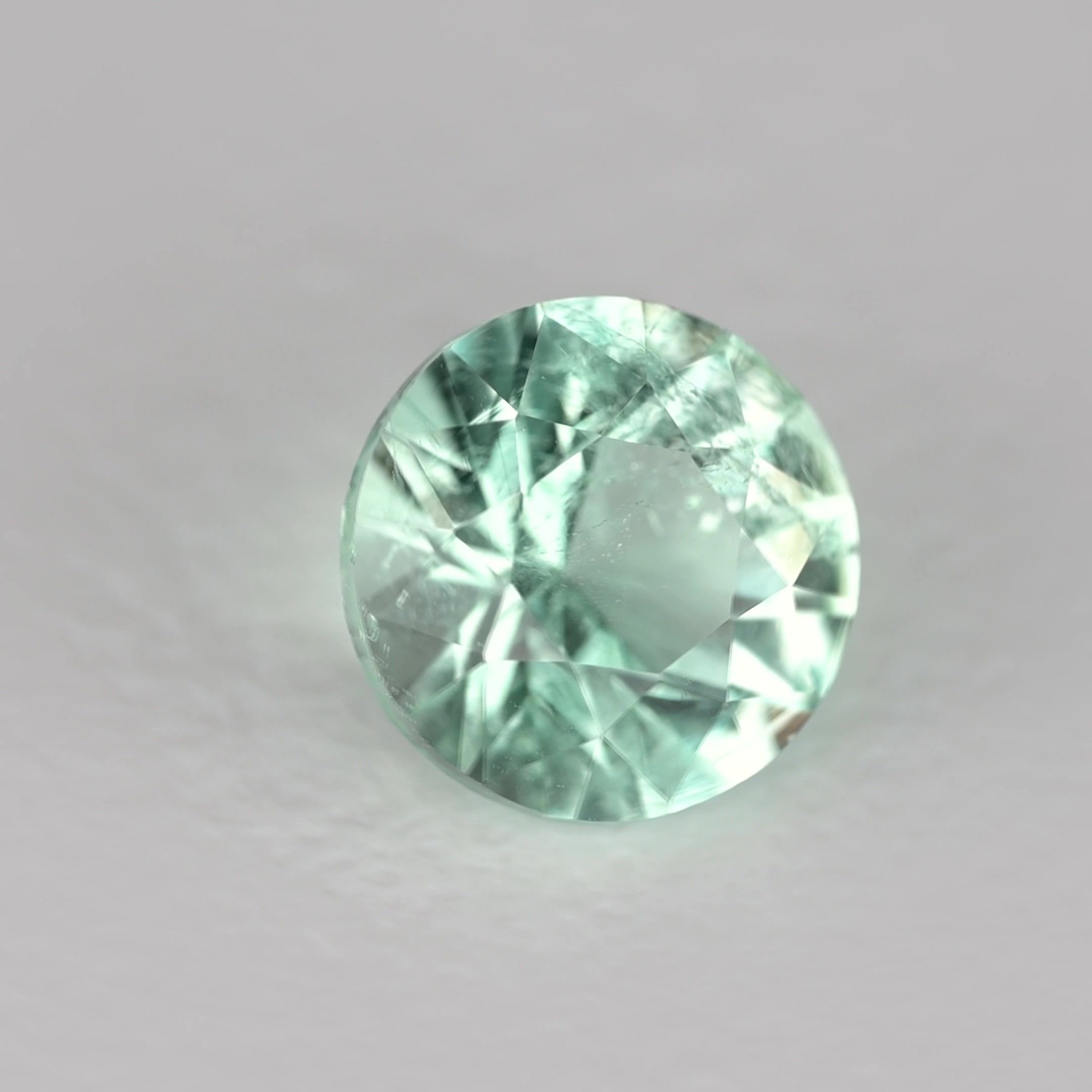 0.52 Carat Green Round Emerald
