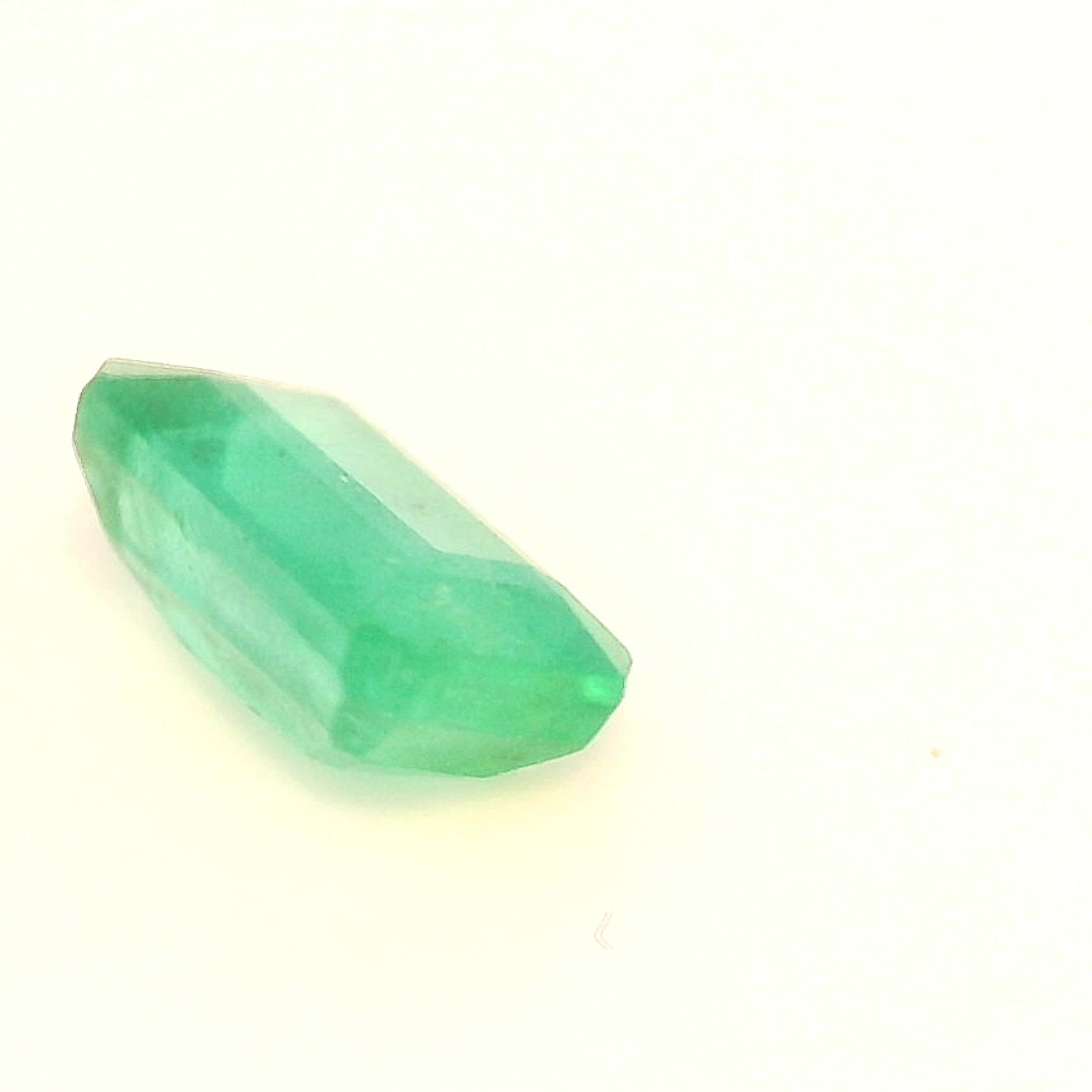 0.54 Carat Light Green Emerald-Cut Emerald