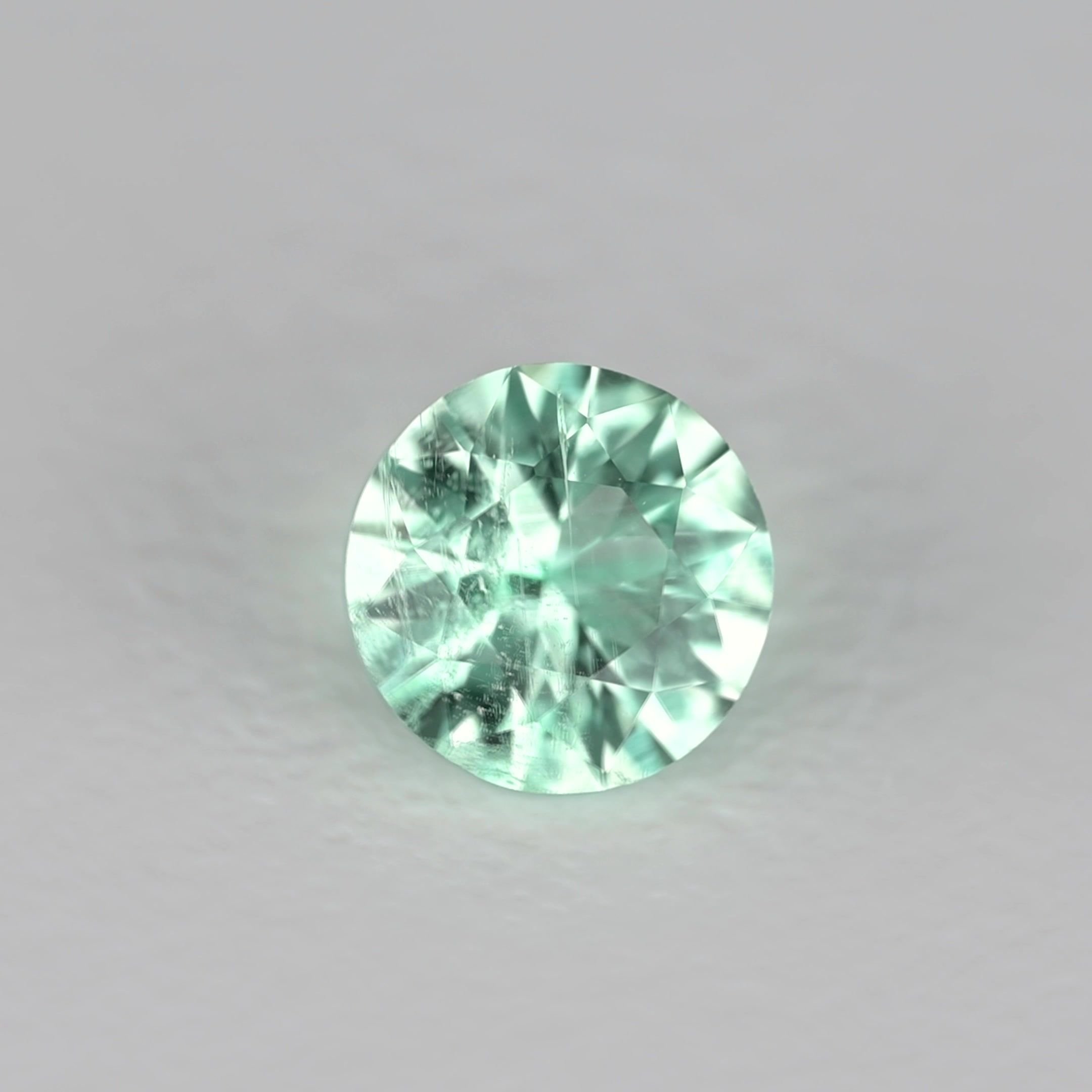 0.28 Carat Green Round Emerald