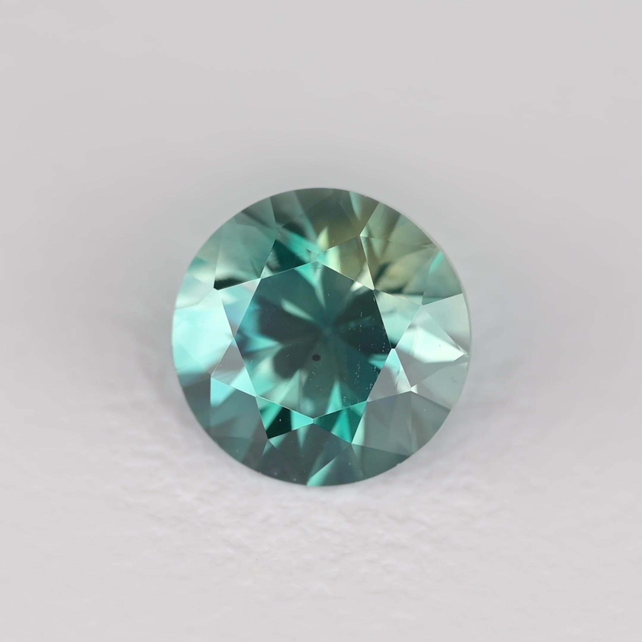 0.67 Carat Teal Round Sapphire