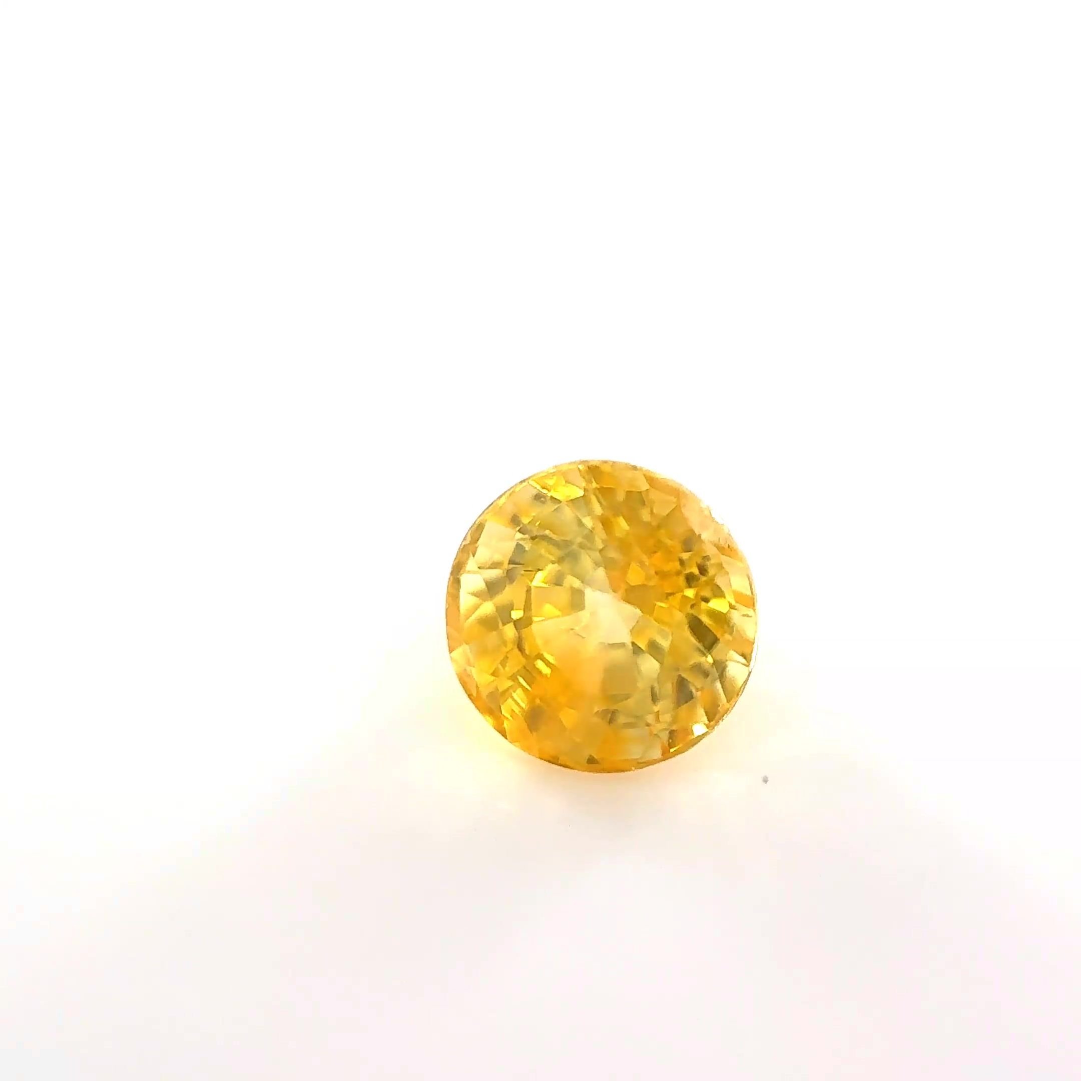 0.68 Carat Yellow Round Sapphire