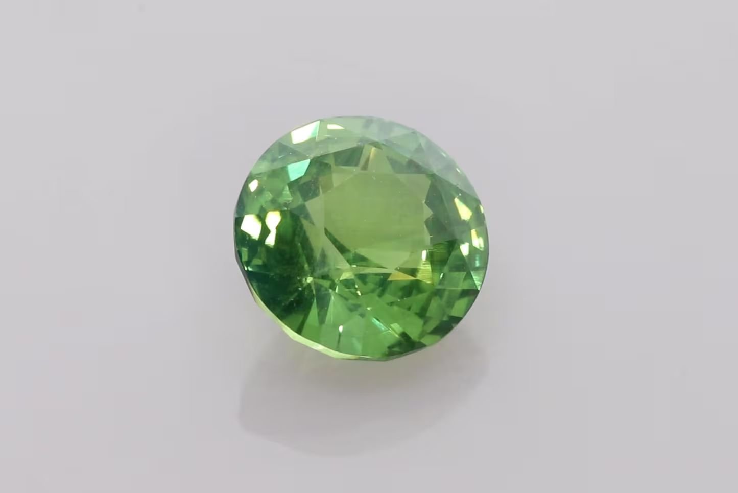 4.98 Carat Vivid Green Round Sapphire